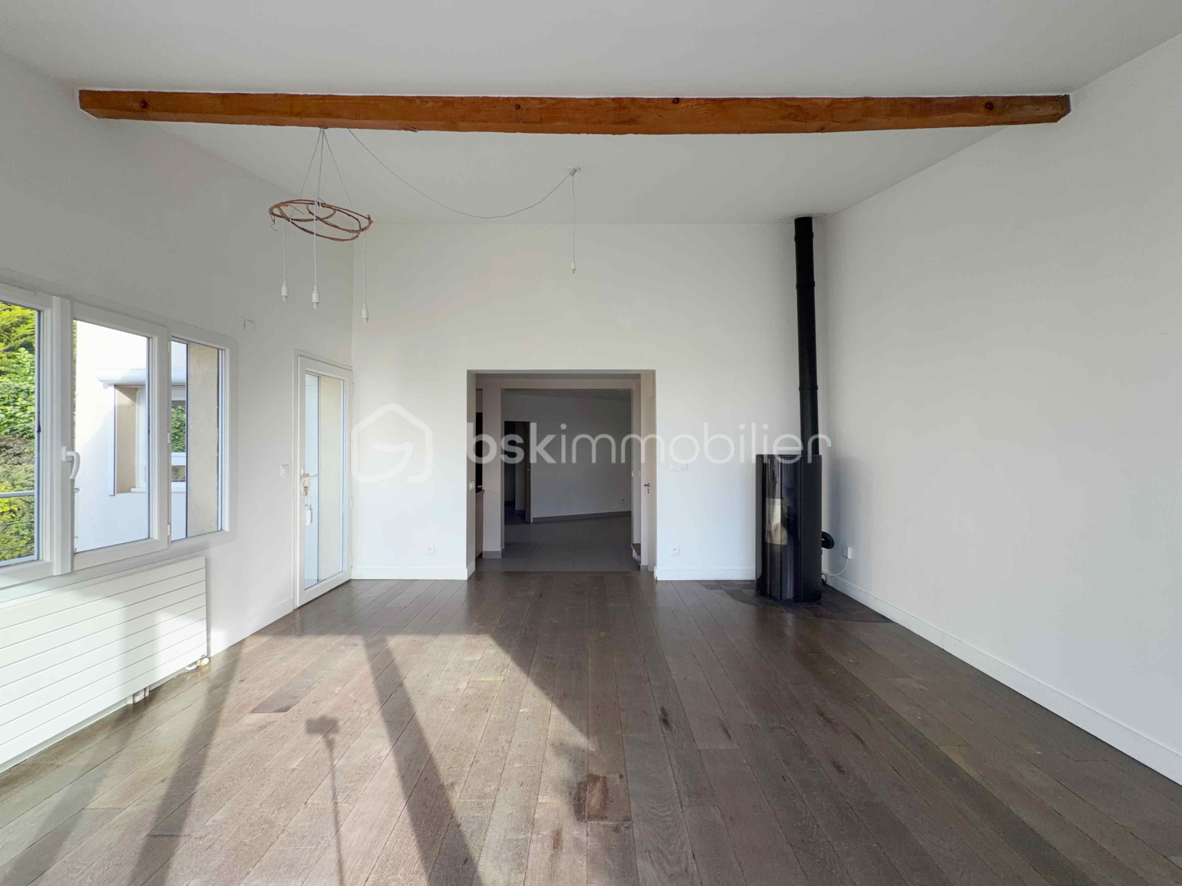 maison-suresnes-sejour-lumineux-parquet.jpg