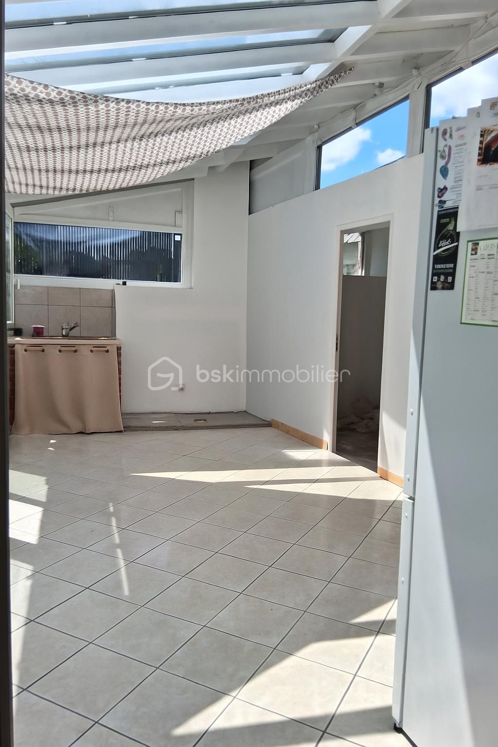 Maison en pierre de 139,50 m² - veranda .png
