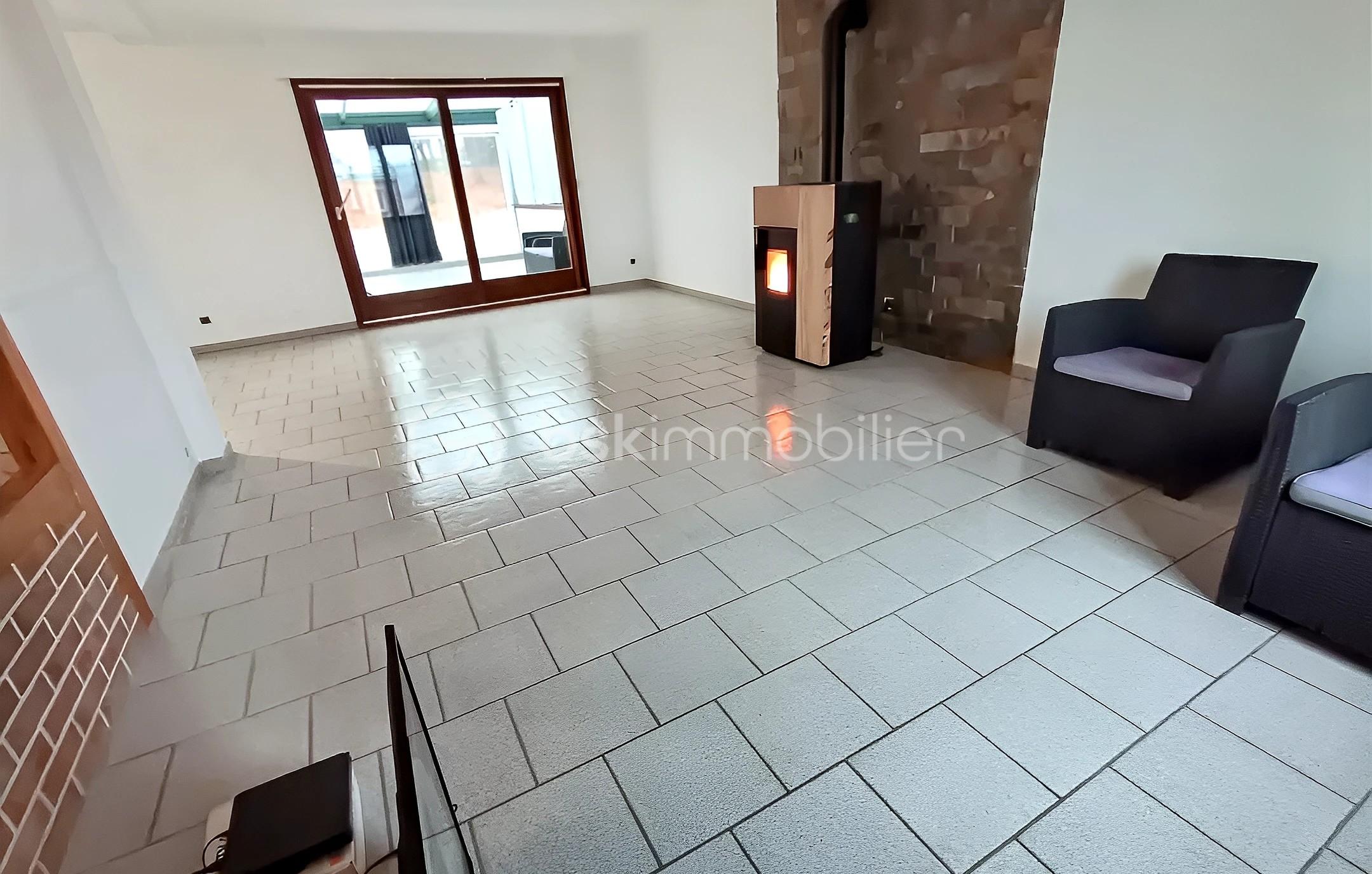 Maison traditionnelle de 122 m² - GIV PIZZONI à GOURGEOT sejour double v veranda.jpg