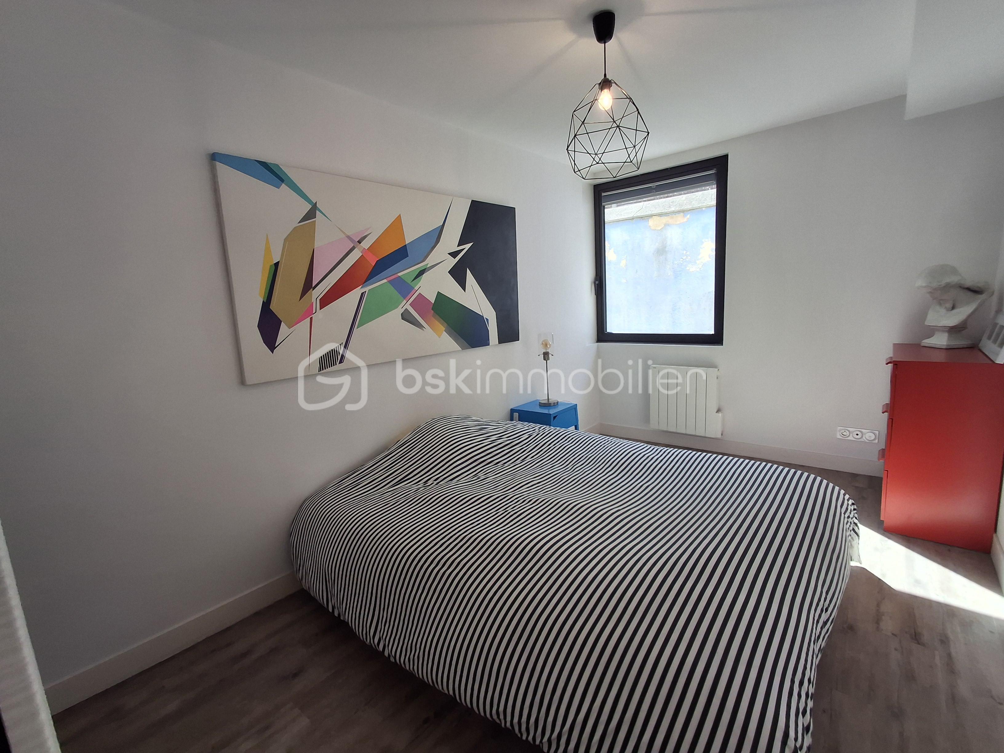 Appartement de 60 m² - ch 1 paysage vers fenetre.jpg