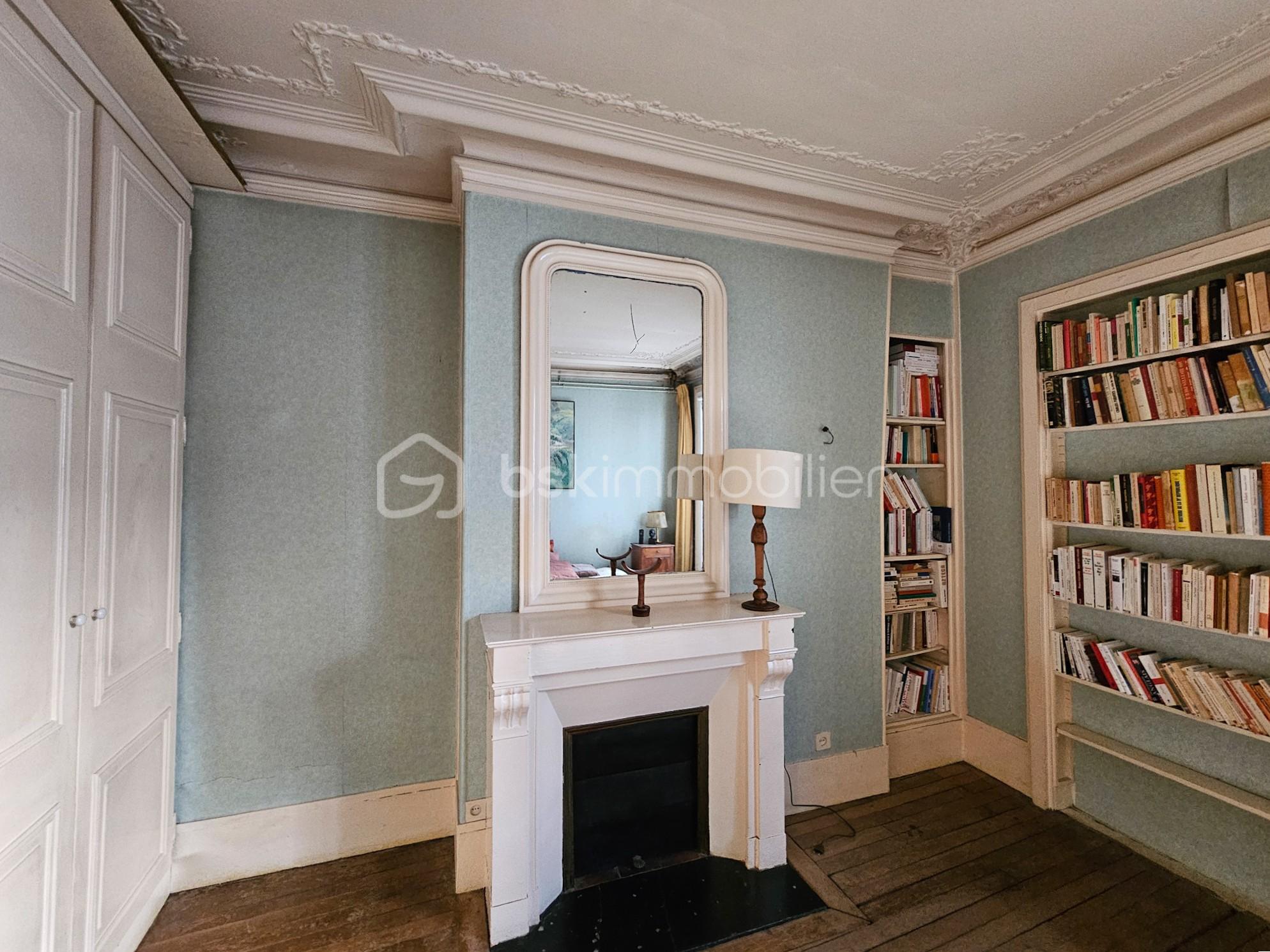 Appartement de 81,60 m² - cheminée chambre 2.jpg