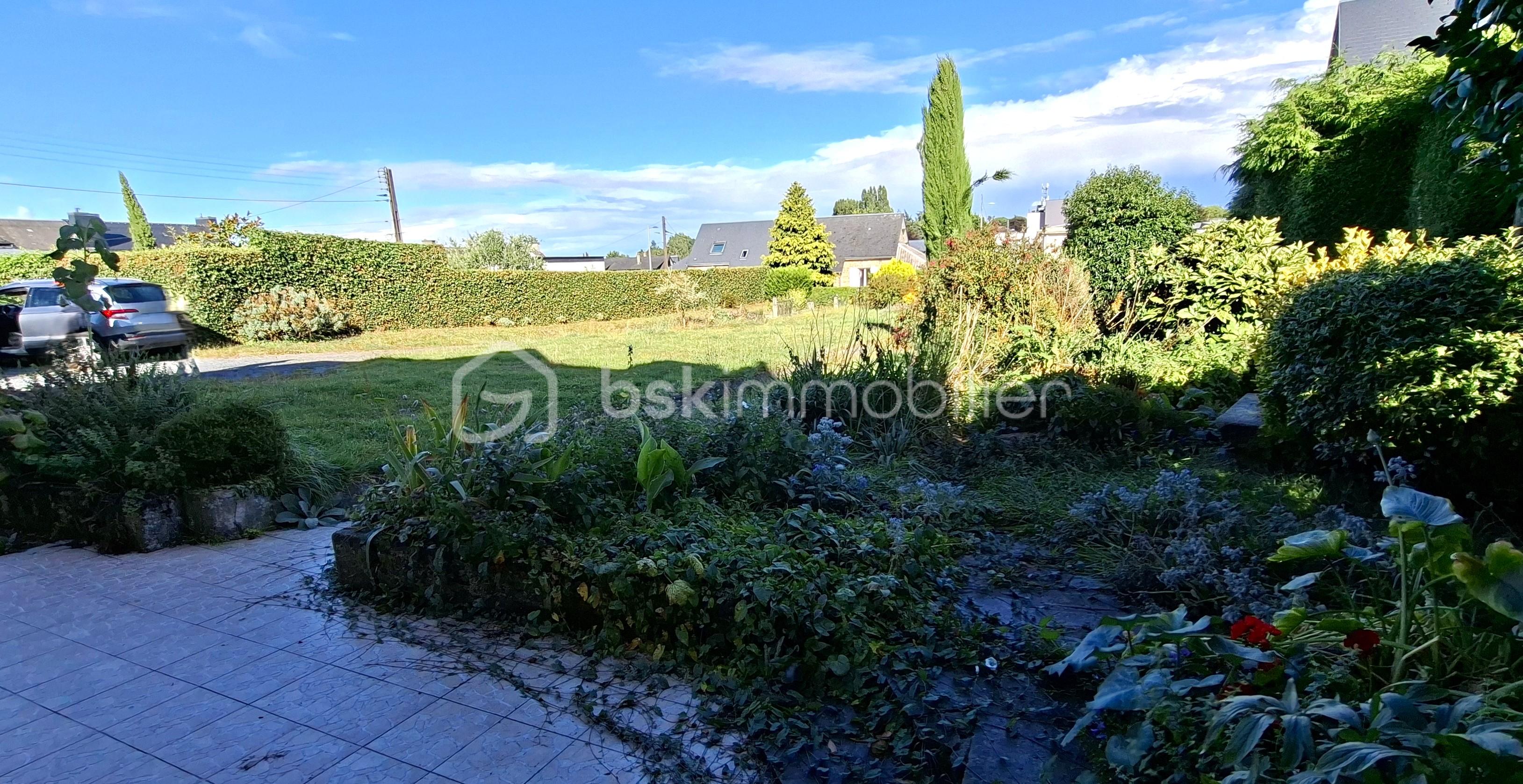 Maison en pierre de 112 m² - CHUBERRE vue terrain vers portail 1.jpg