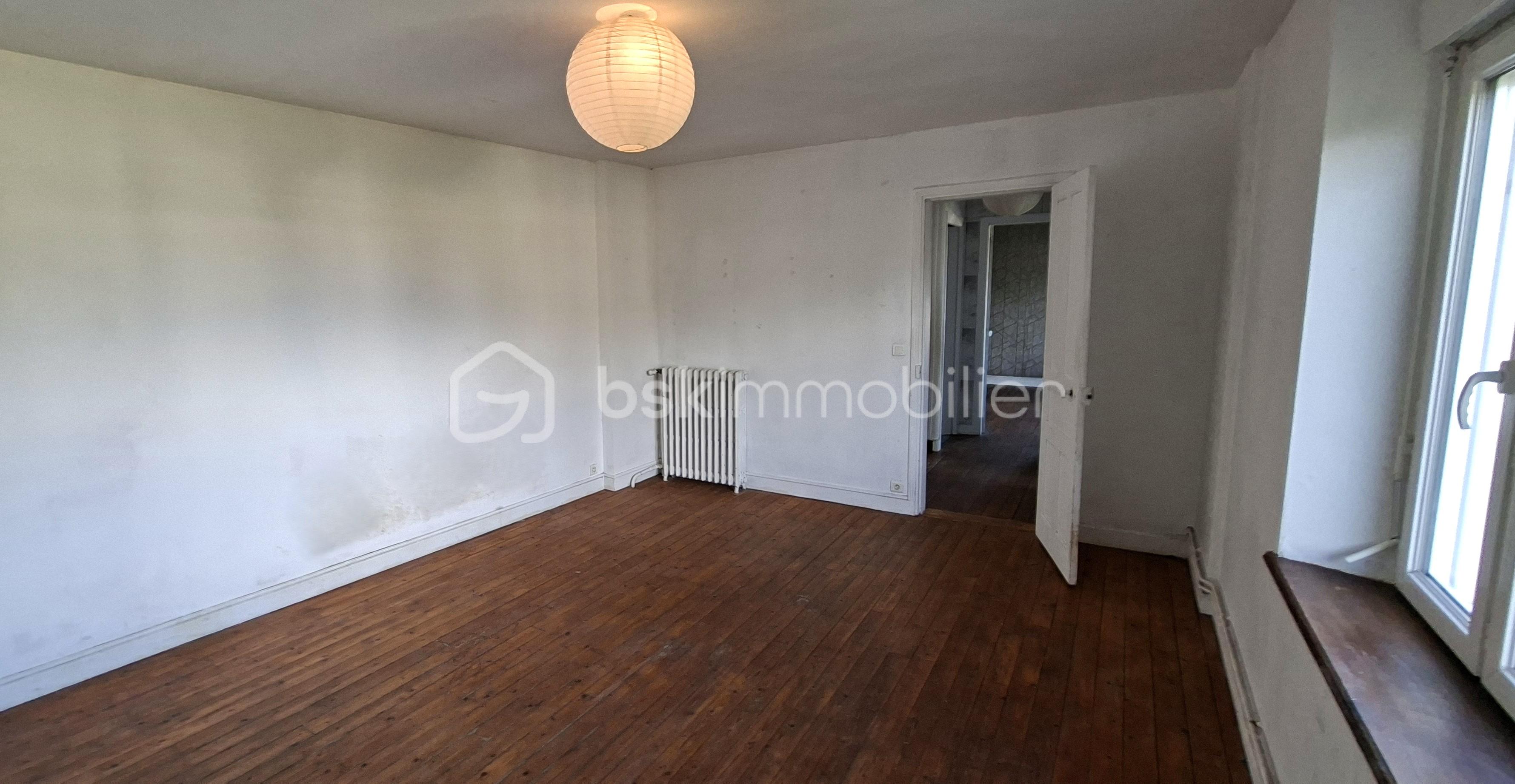 Maison en pierre de 112 m² - CHUBERRE chambre étage 1 1.jpg
