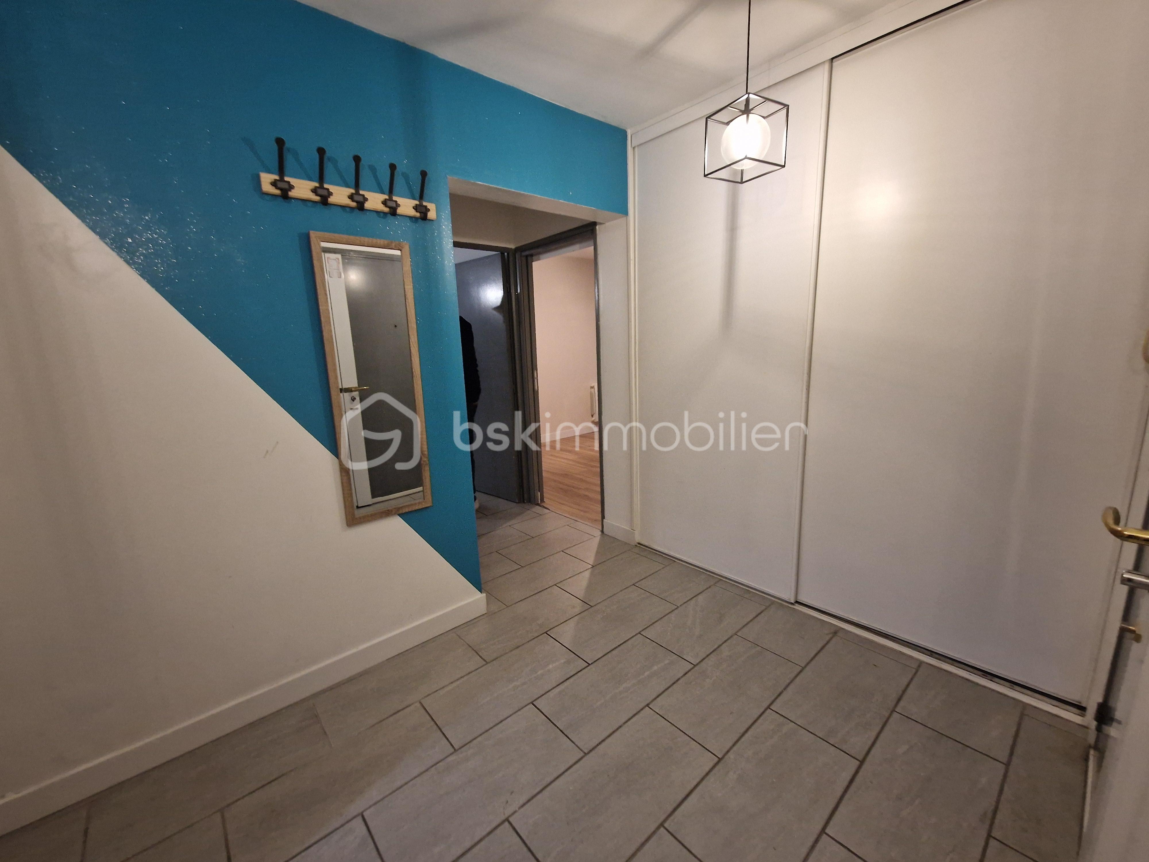 Appartement de 90,80 m² - Entrée Coty.jpg