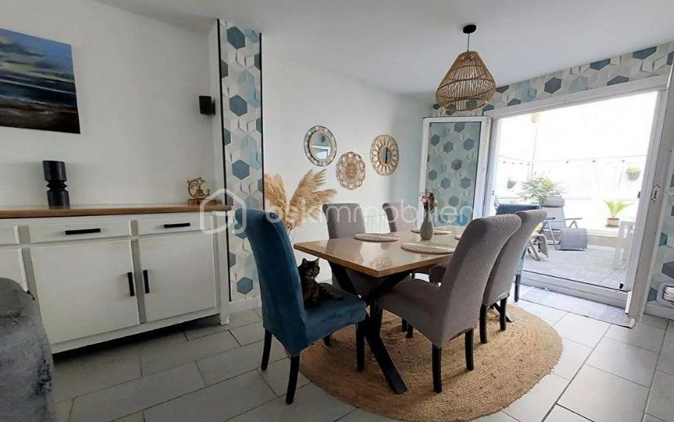 Appartement de 90,80 m² - Salle à manger accès terrasse.jpg