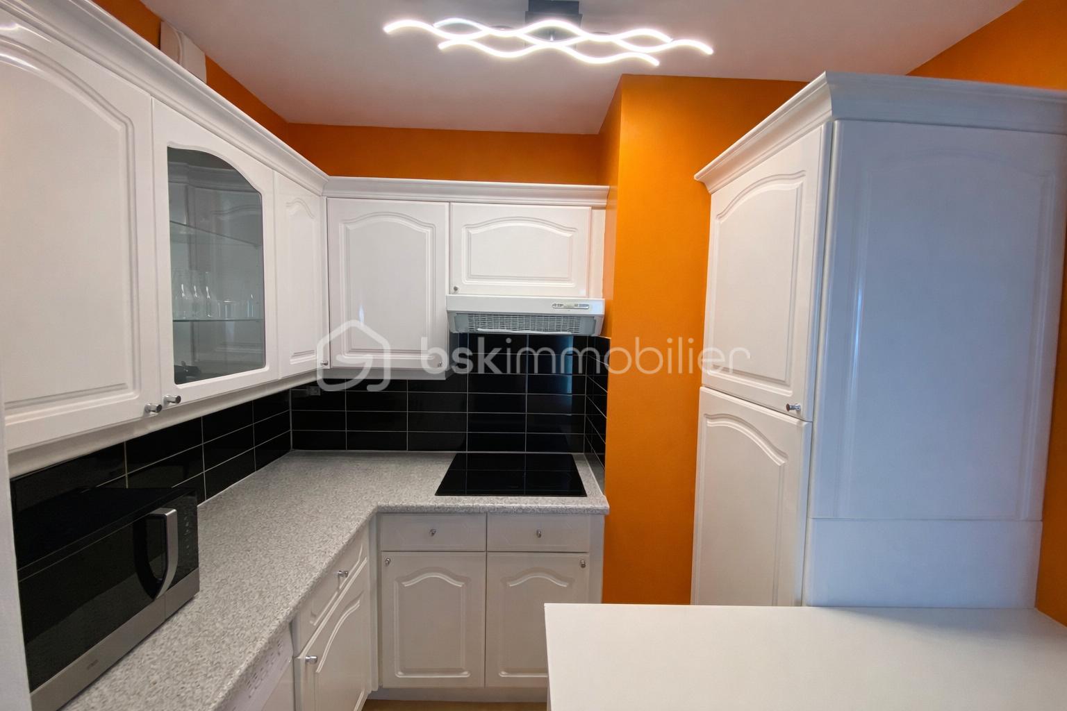 Cuisine moderne aux accents orange.png