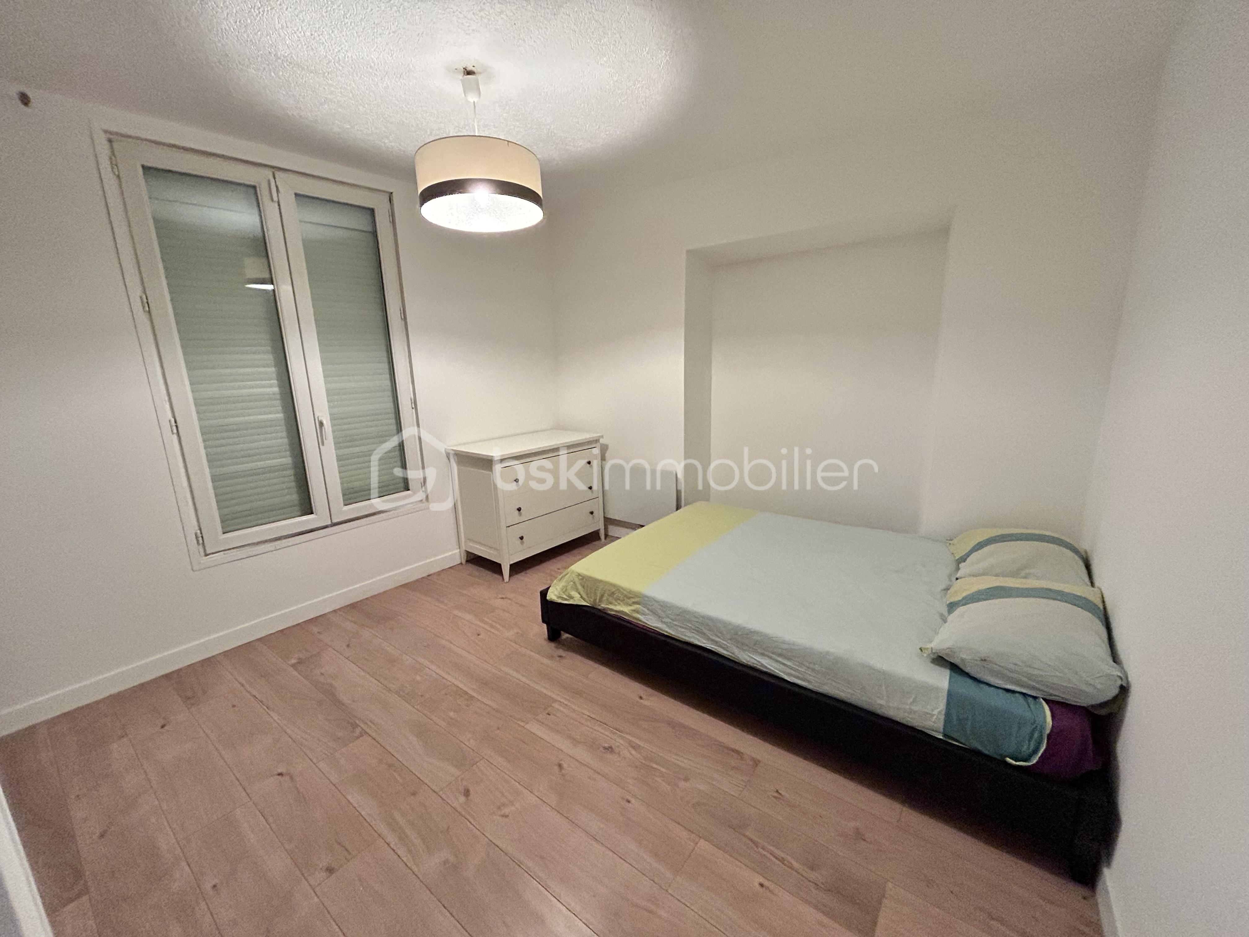Appartement de 55,80 m² - chambre.jpeg