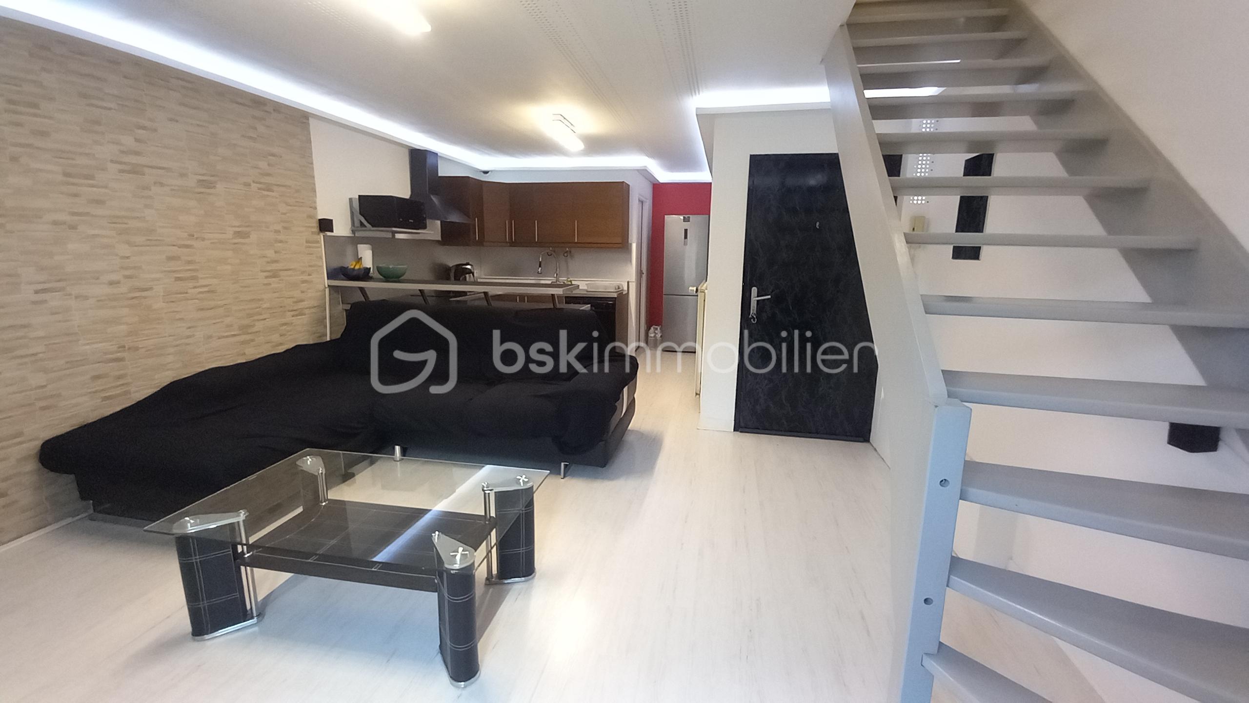 Appartement de 90 m² - Appartement La Côte St André Les Halles Photo Salon 7.jpg
