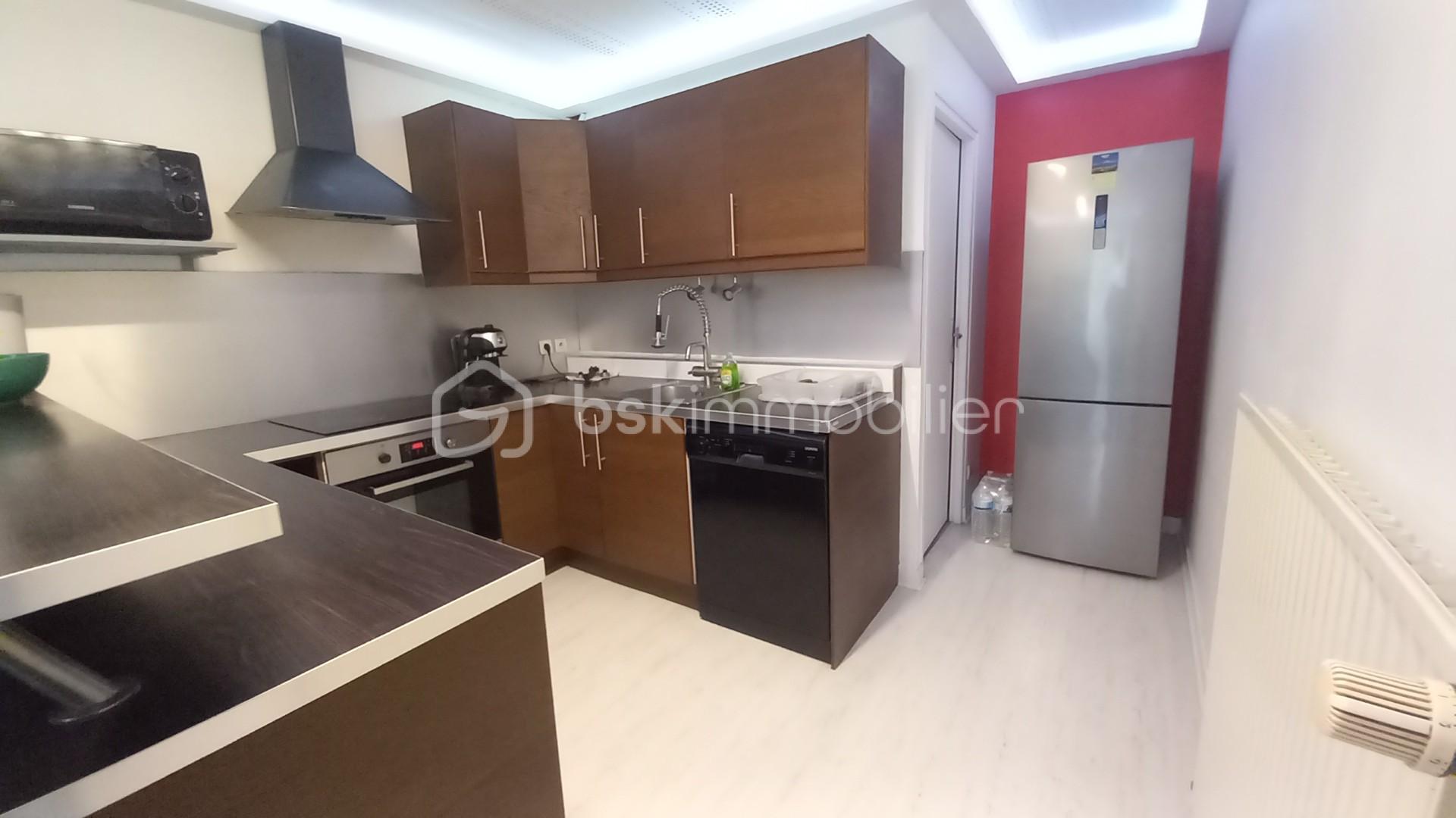 Appartement de 90 m² - Appartement La cote St Andre - Les Halles - Photo cuisine.jpg