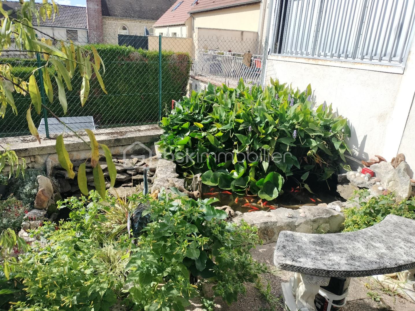 Maison de 100,69 m² - photo 4.jpg