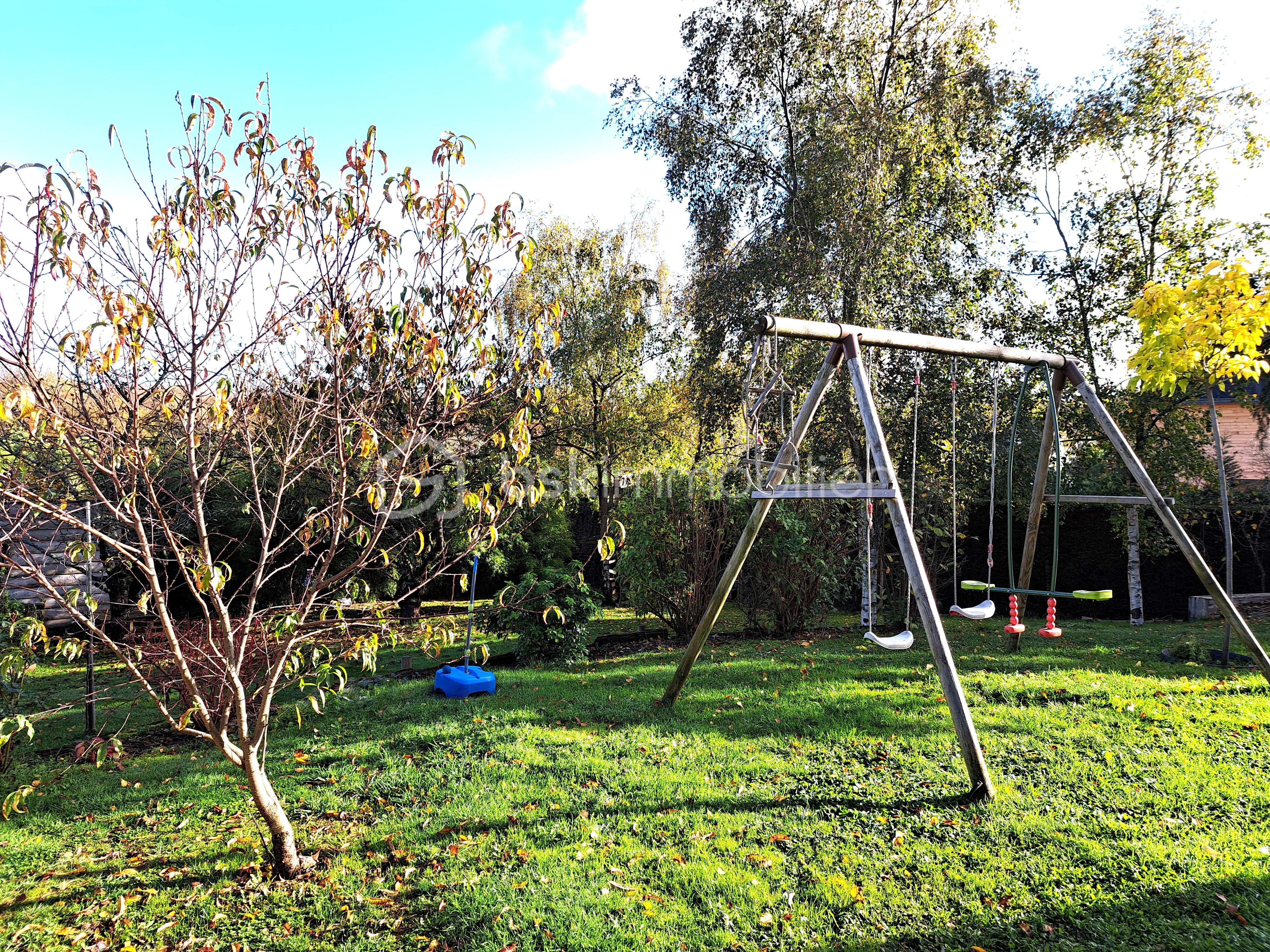 Maison de 106 m² - JARDIN DERRIERE.jpg