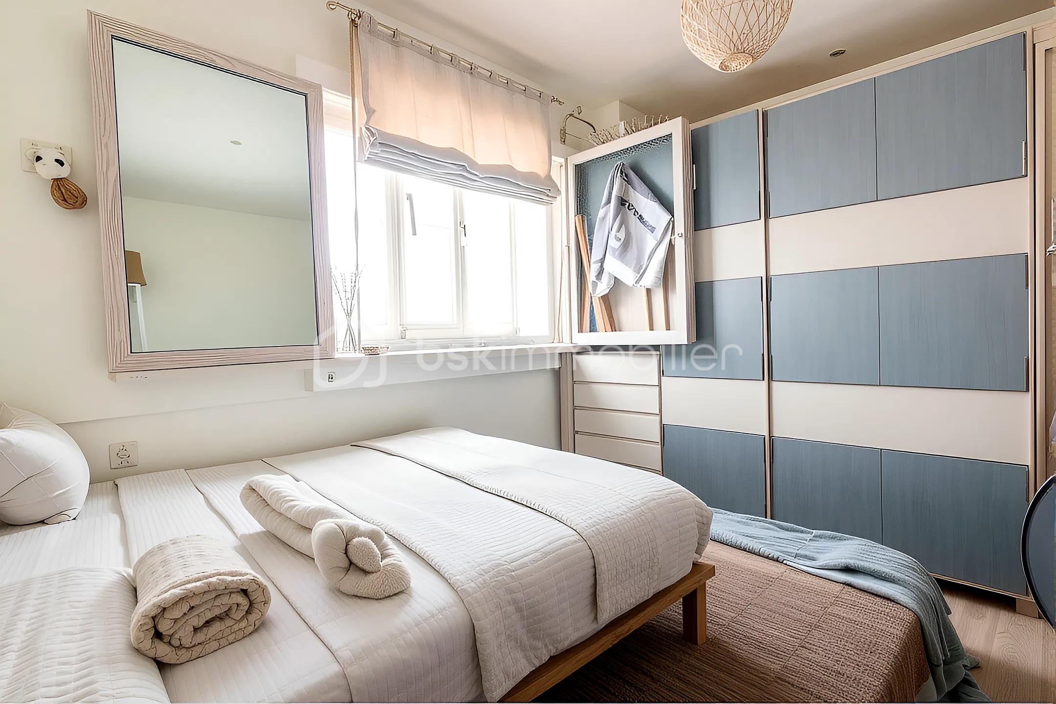 Appartement de 70 m² - George Chambre 1 Home Staguée Danim moyen.jpg