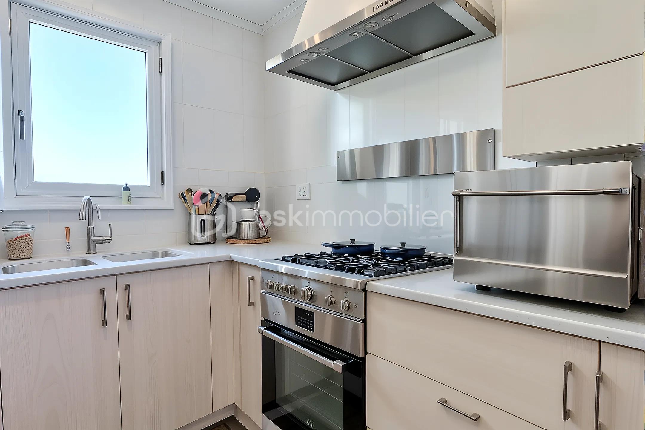 Appartement de 70 m² - George Cuisine Home Staguée Danim OK.jpg