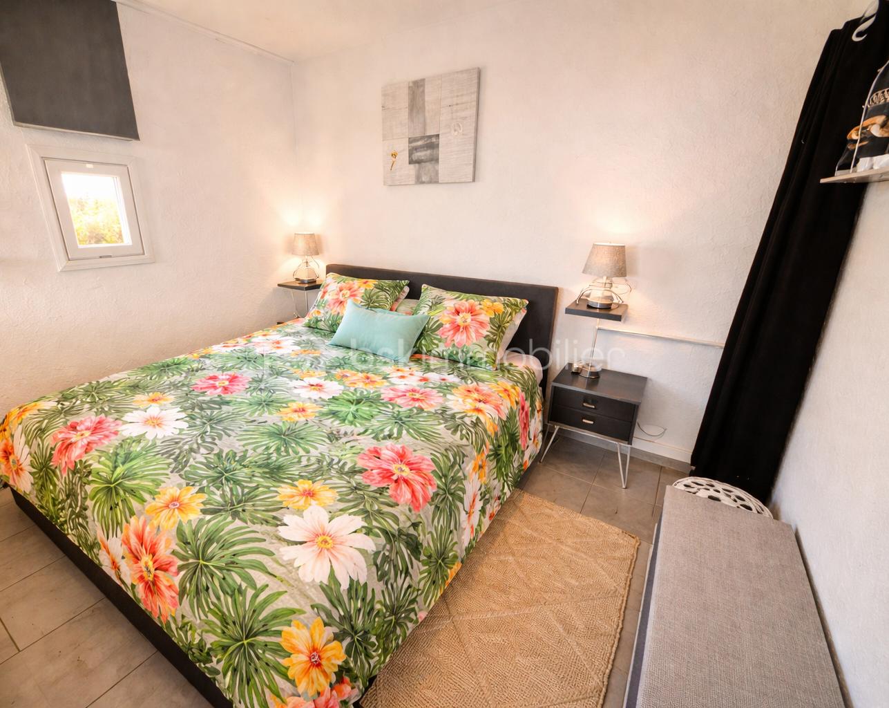 Tropical-inspired bedroom with vibrant accents.png