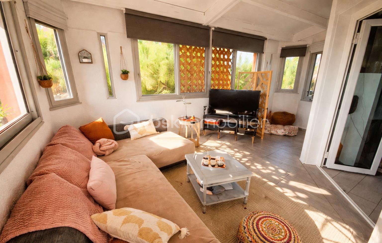 Cozy living room with natural light.png