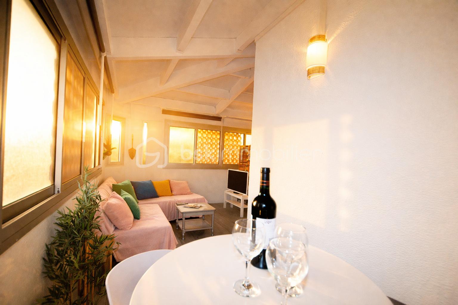 Sunlit living area with wine setup.png