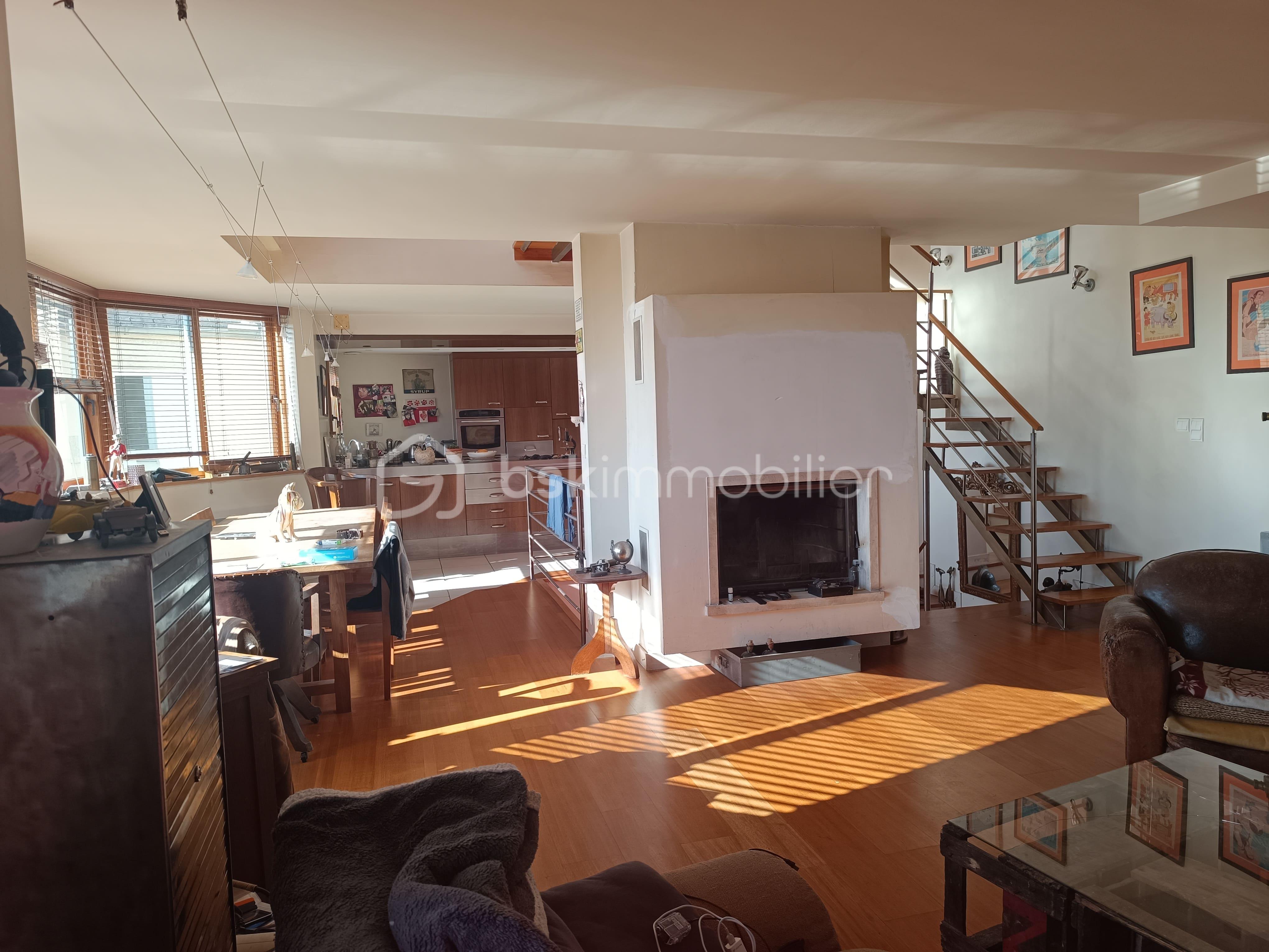 Maison de ville de 140 m² - salon cheminée.jpg