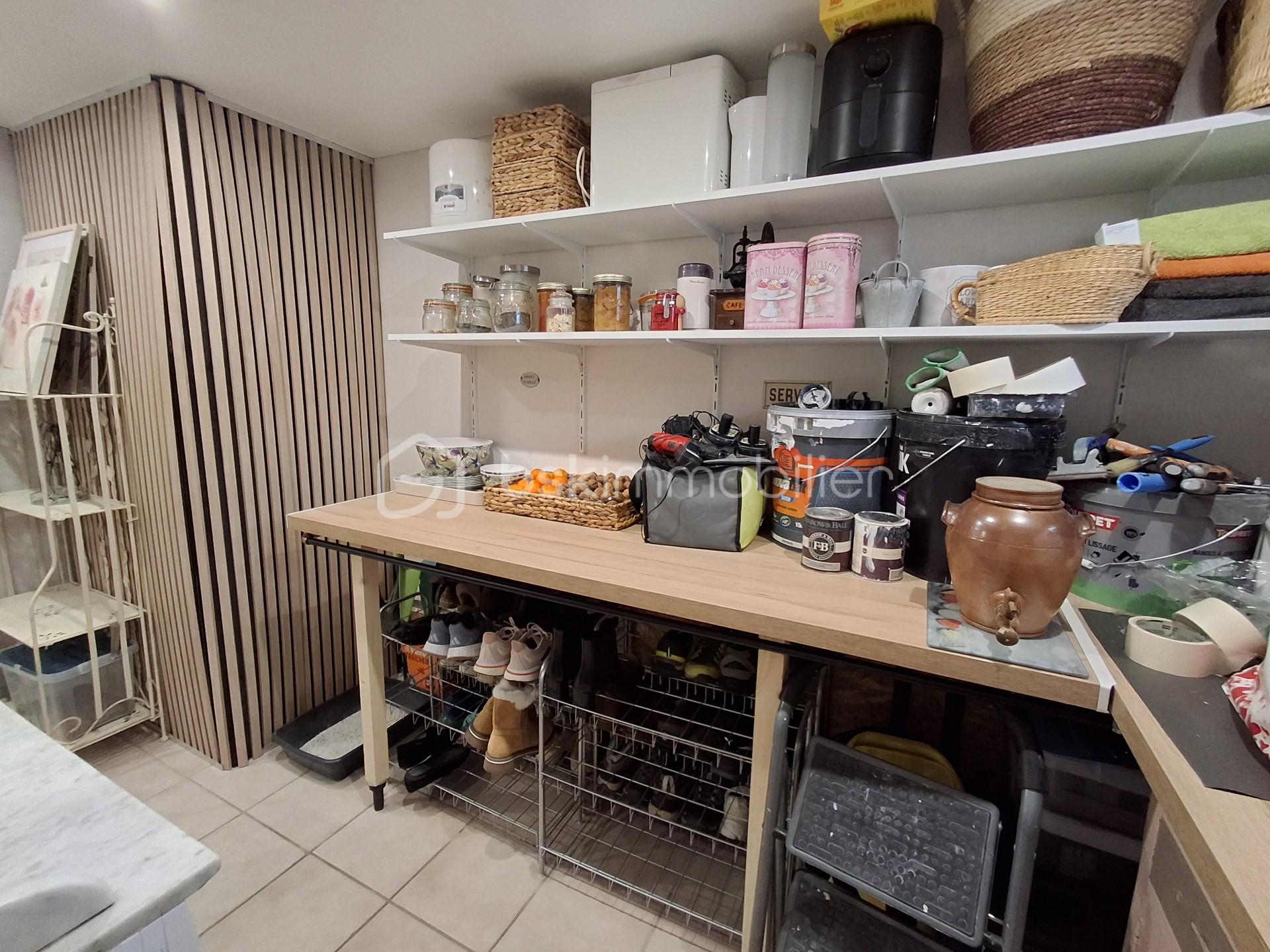 Maison de 92 m² - Arrière cuisine CL Paysage.jpg