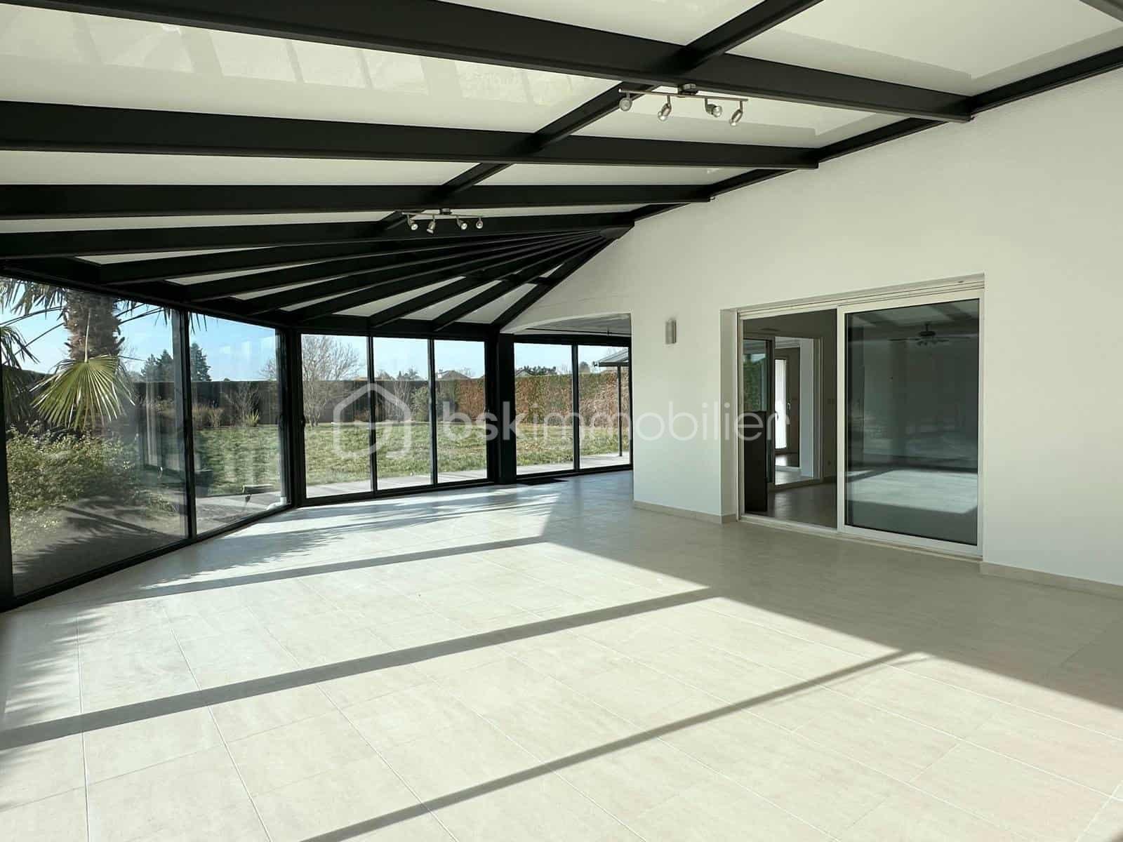 Maison de 143 m² - véranda.jpeg