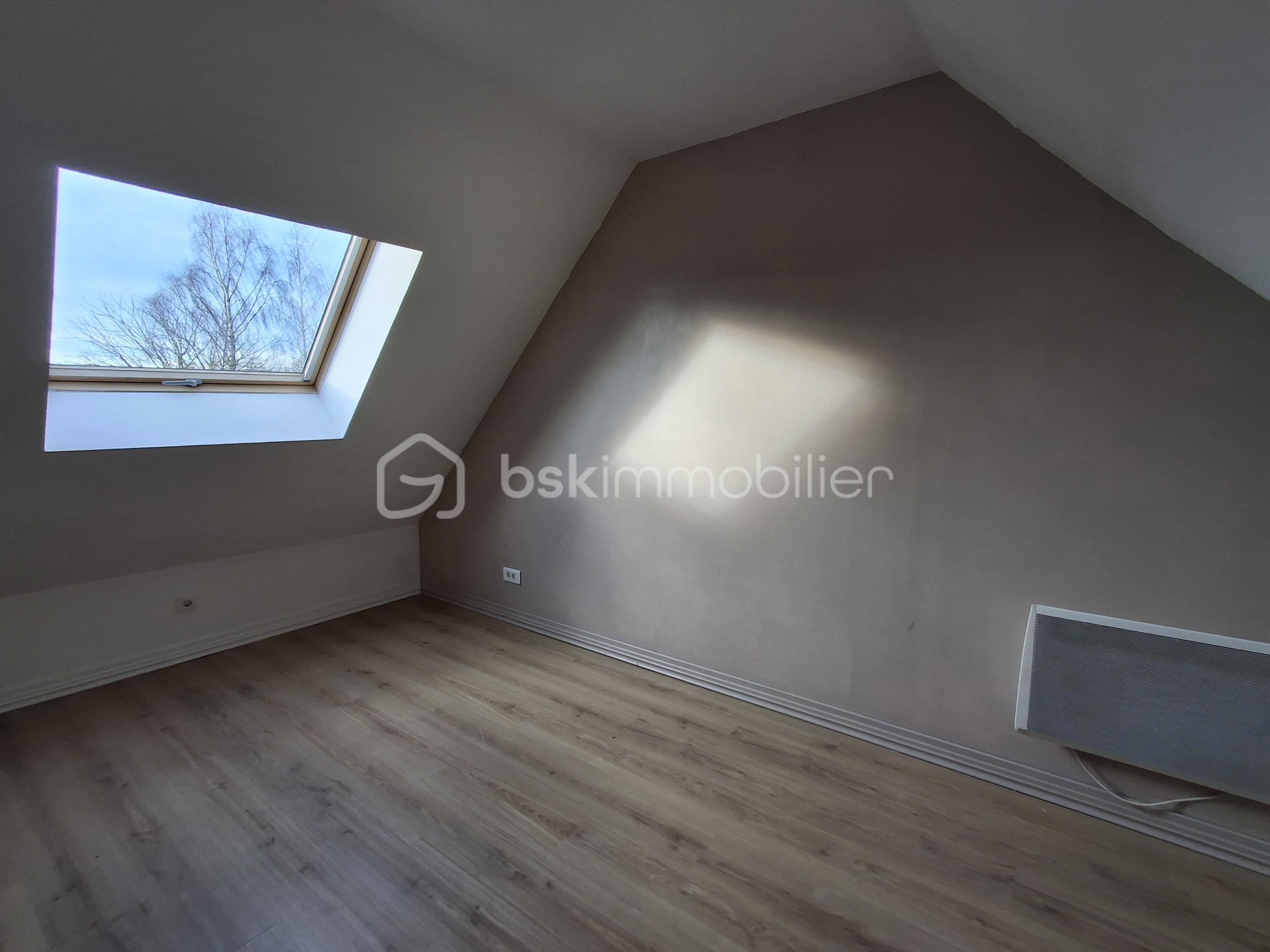 Maison de 125 m² - Chambre dessus garage.png