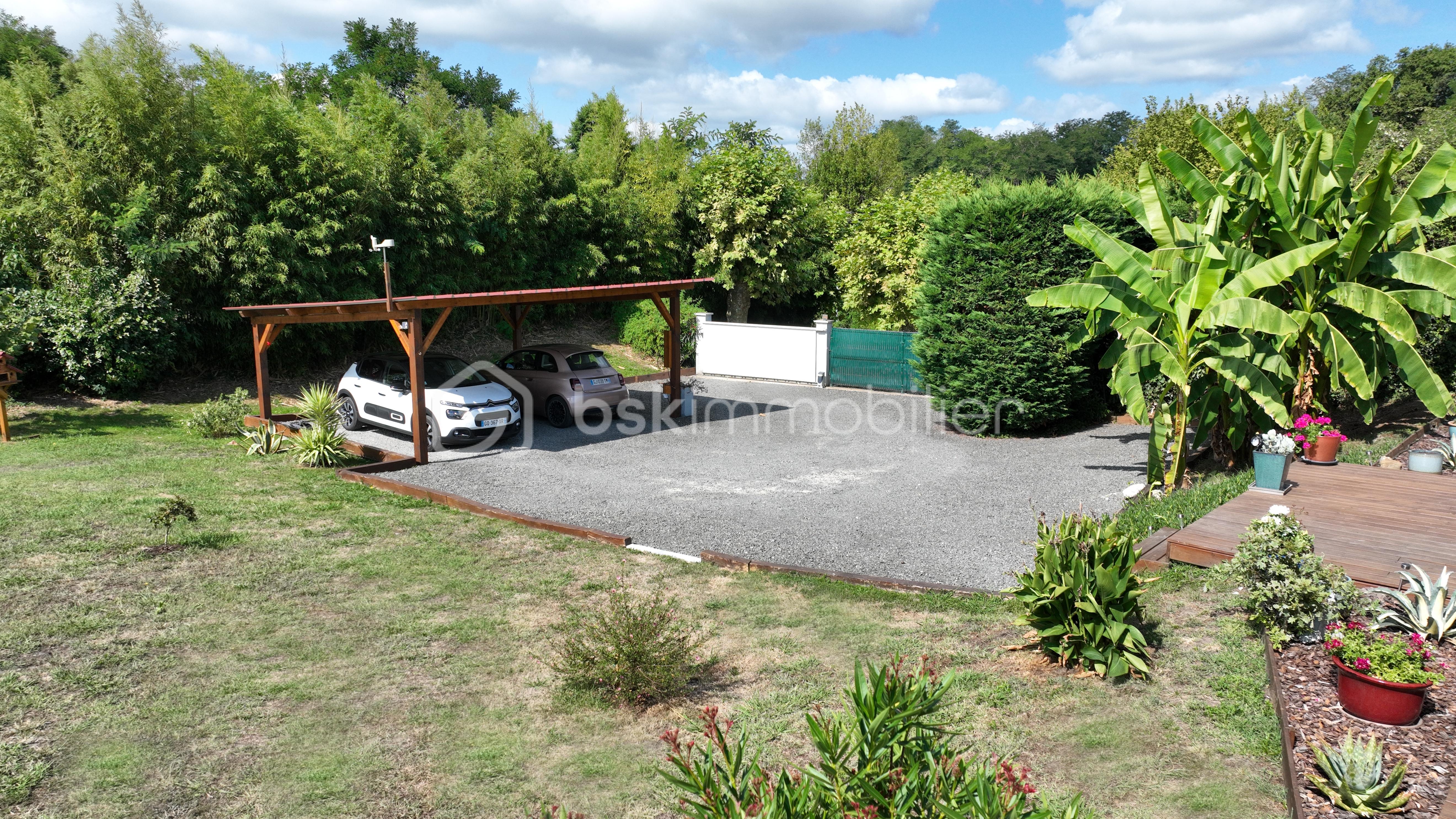 Maison de 185 m² - ABRI GARAGE.jpg