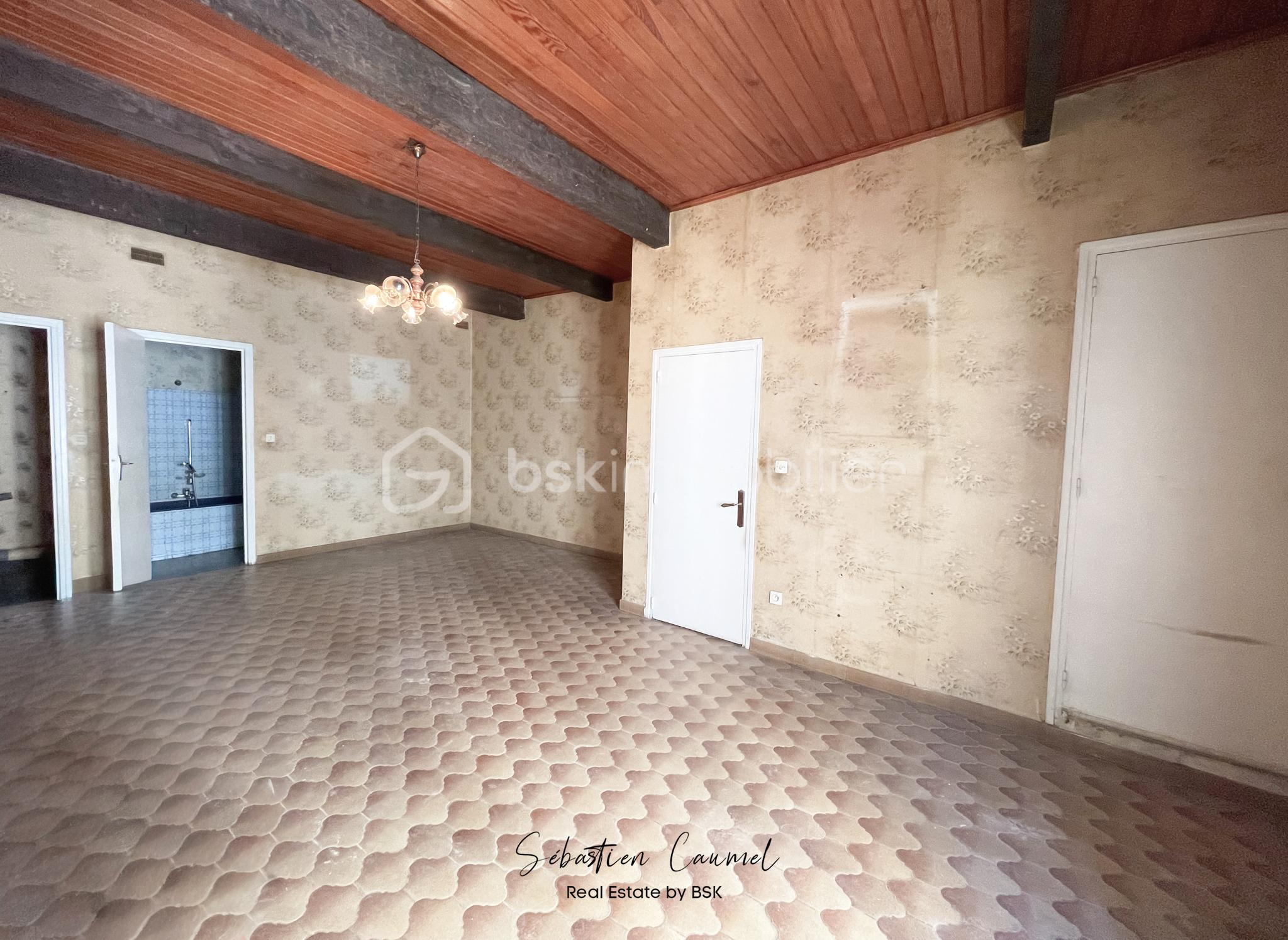 salon-sejour-volume-distribution-maison-village-cournonterral-34660.jpg