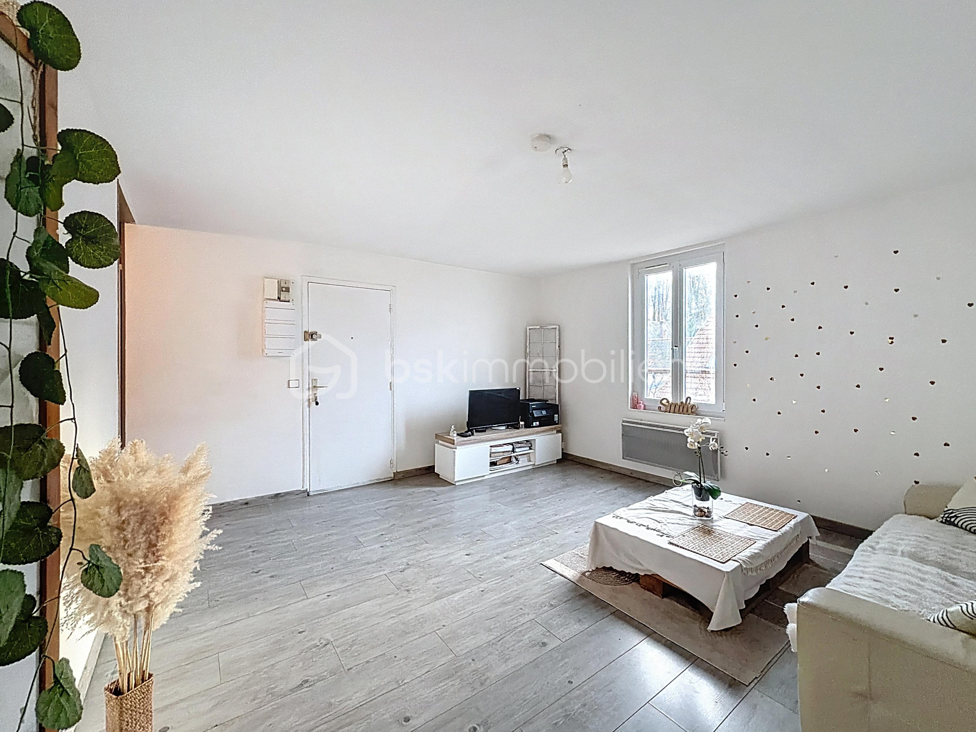 Appartement de 52,50 m² - Salon vue 1.jpg