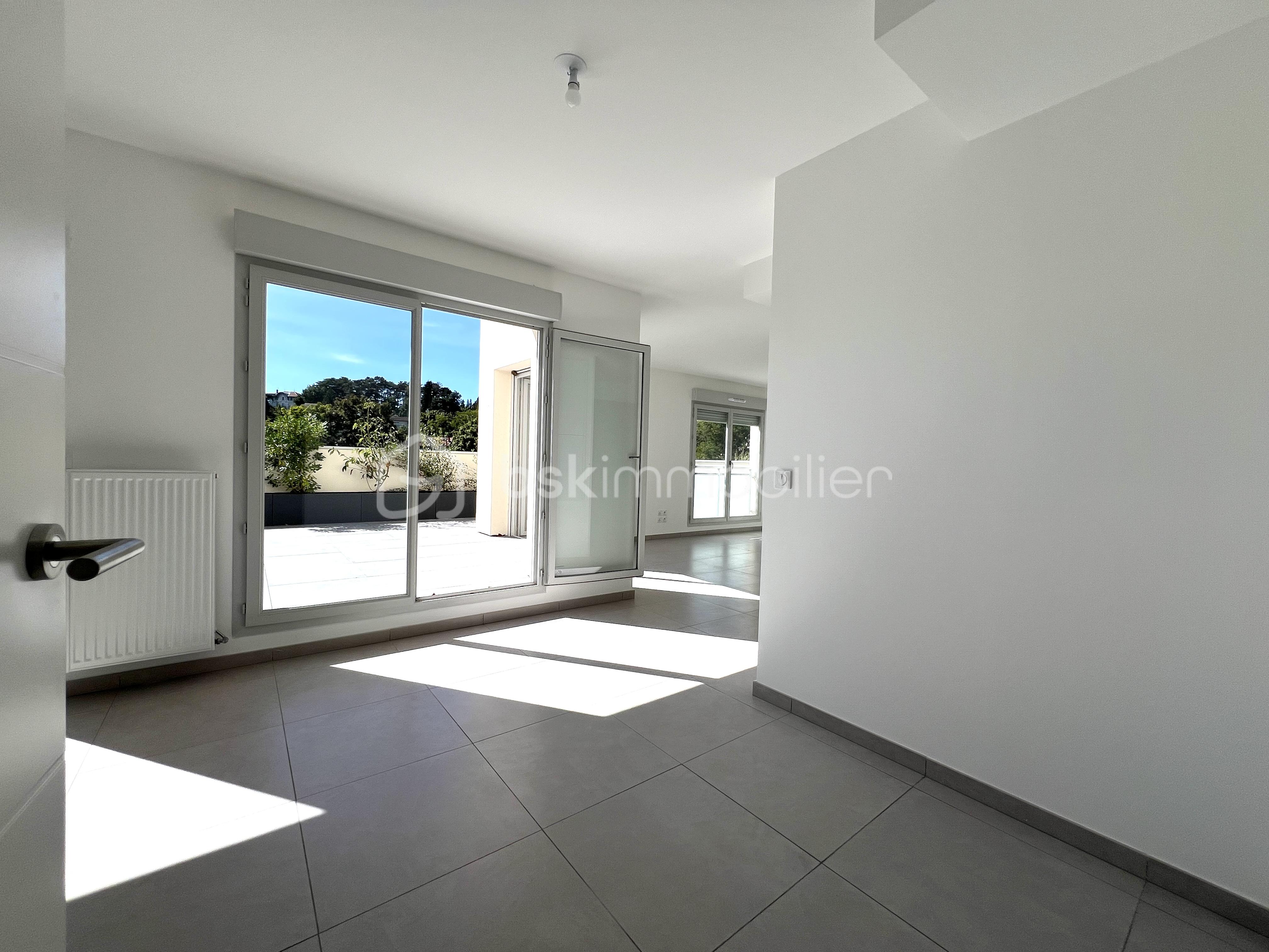 Appartement de 89,89 m² - séjourterrasse.corinne.fischer.crepieux.jpg