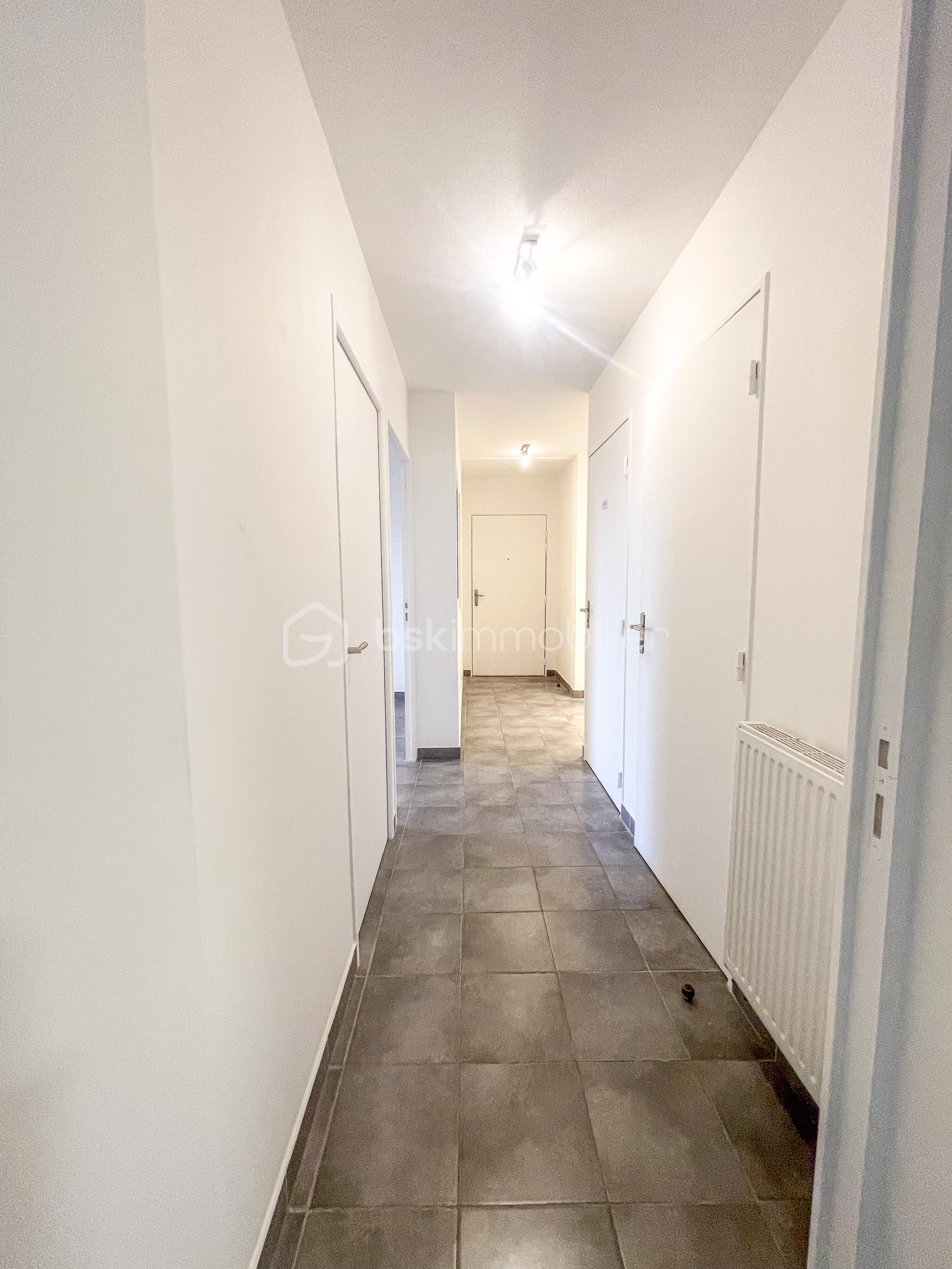 Appartement de 57 m² - DISTRIBUTION 1A.jpg