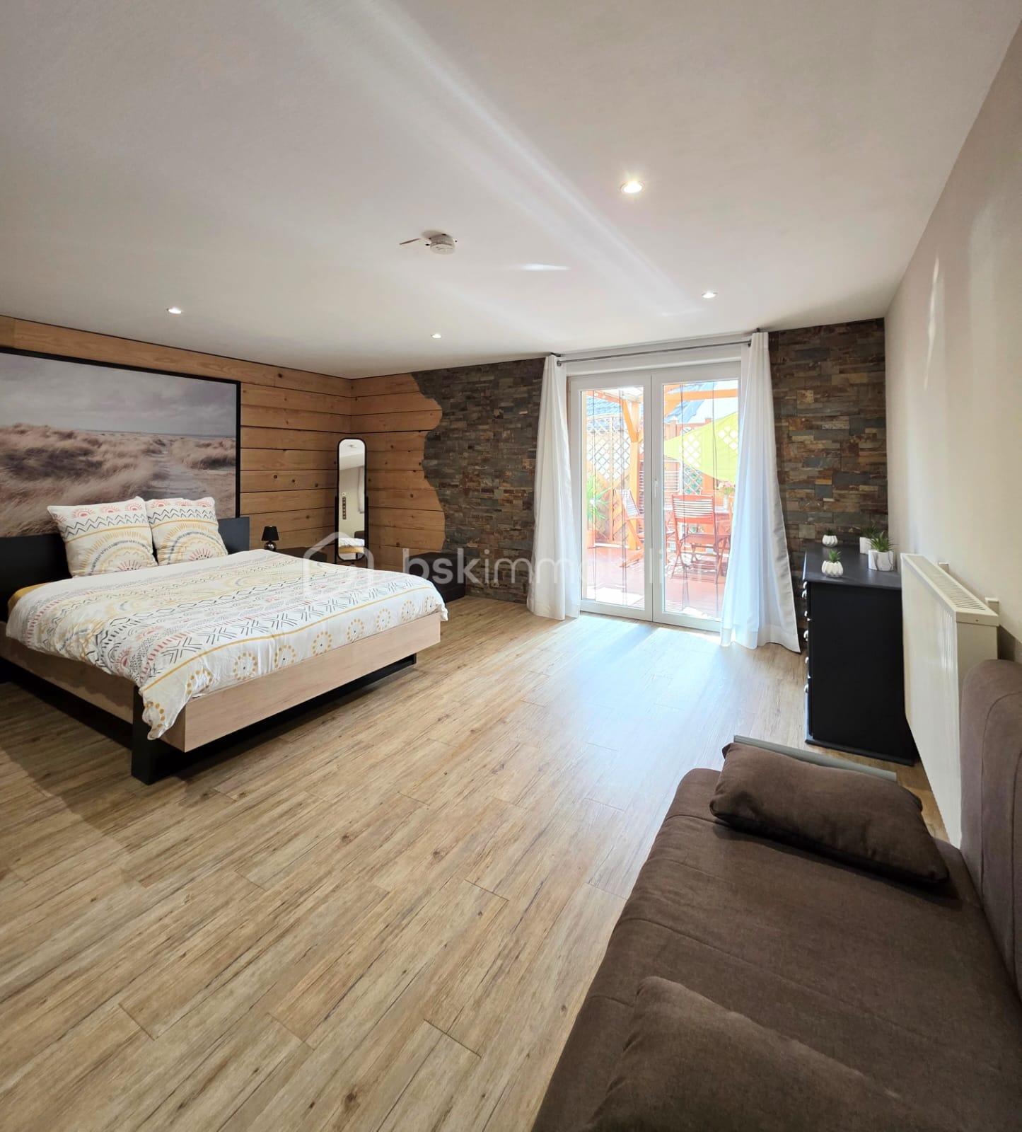 Maison de 148 m² - chambre accès terrasse.jpg