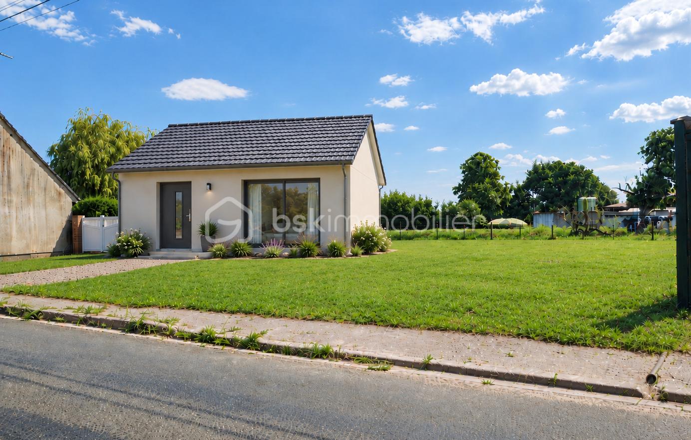 Maison moderne sous ciel bleu.png