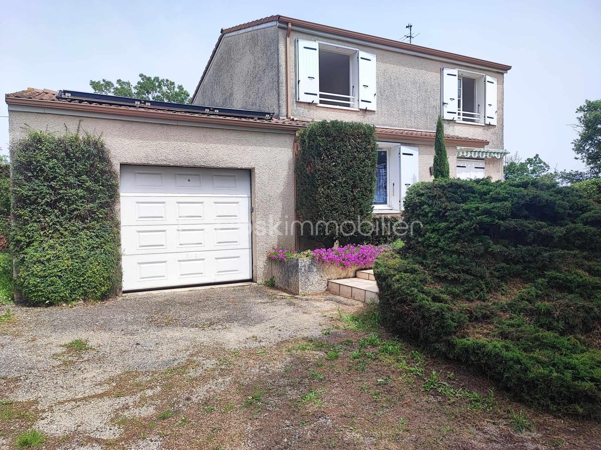 Maison de 107 m² - maison coté cuisine annonce.jpg