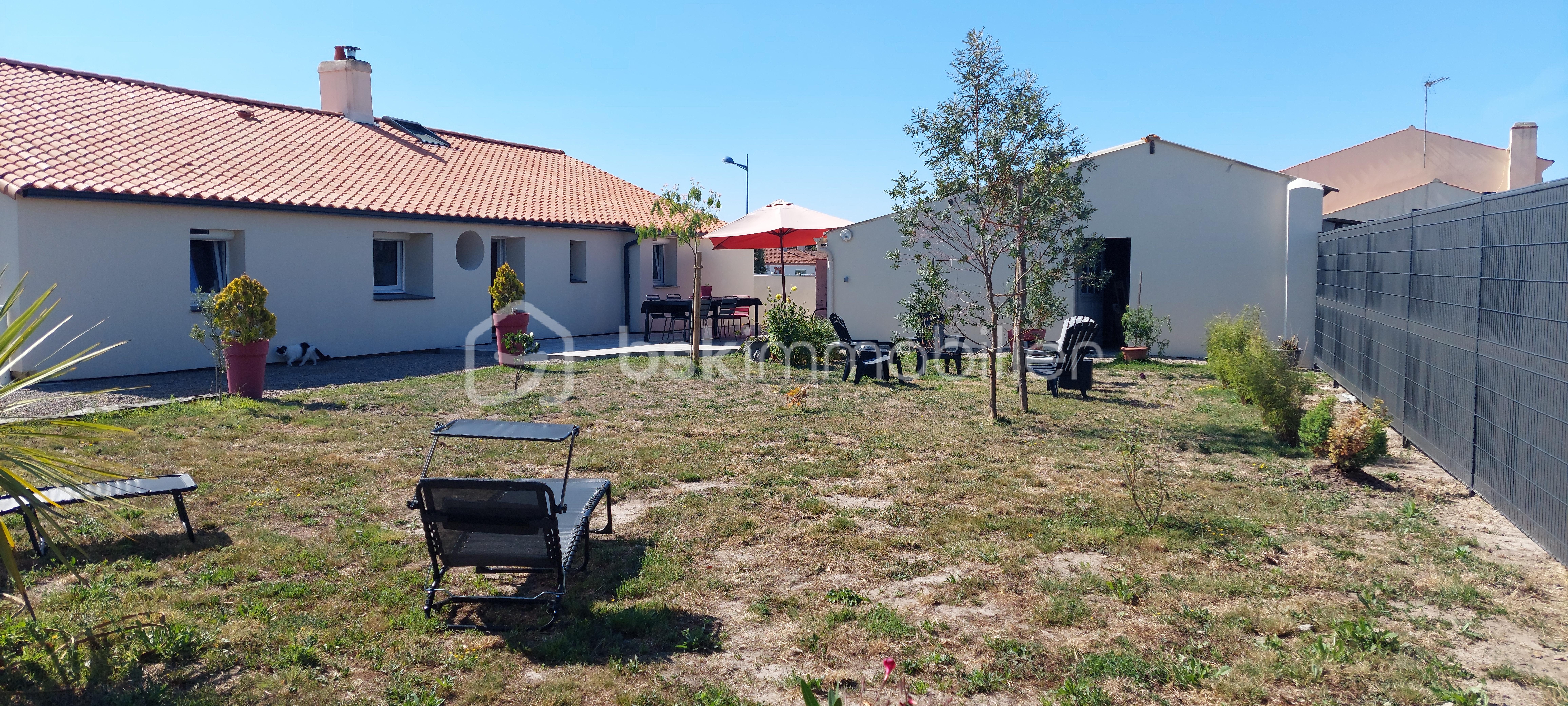 Maison de 96 m² - 1000027058.jpVUE TERRASSE DEUIS LA HAIE.jpg