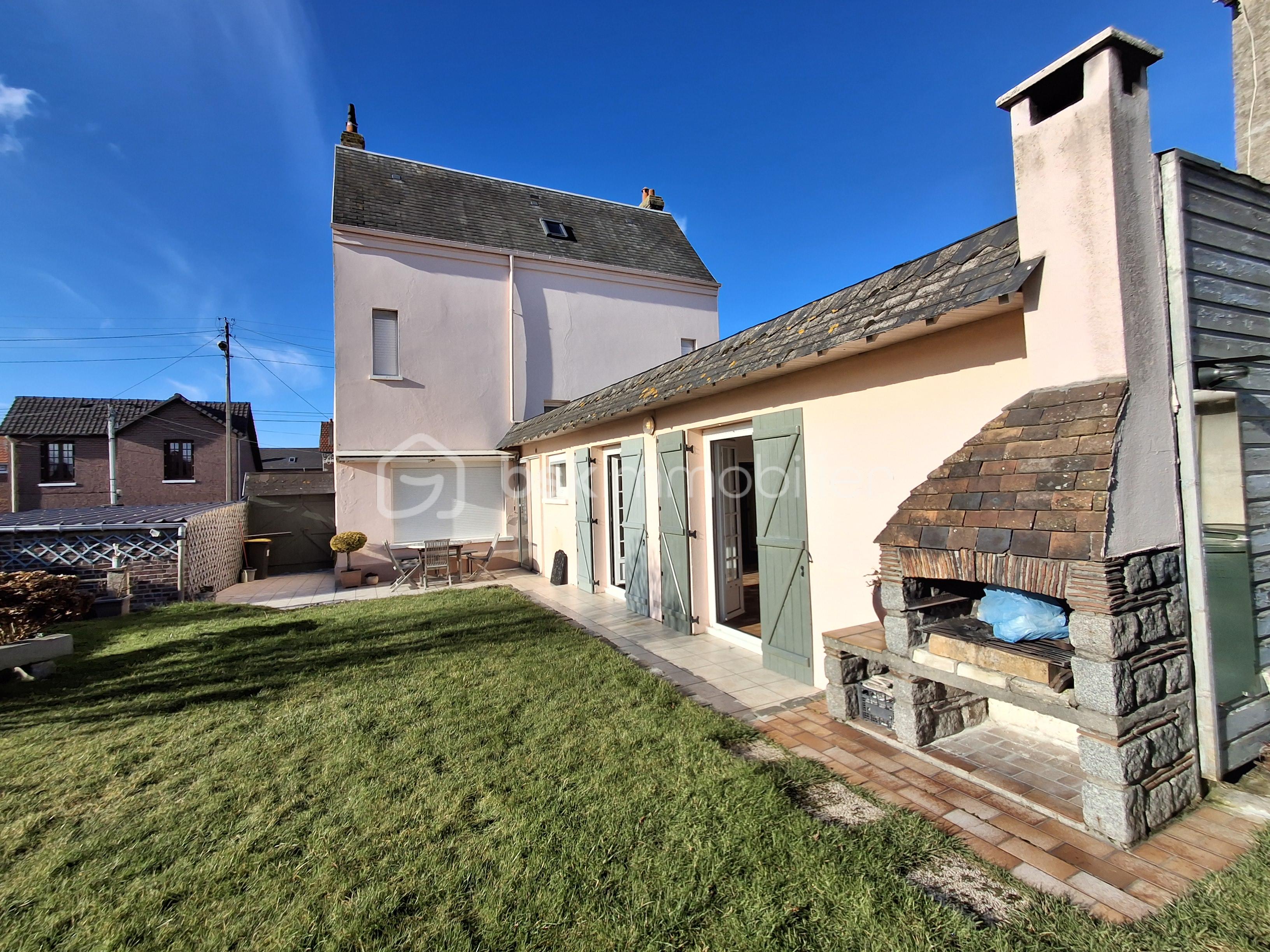 Maison de 135 m² - Face arrière et BBQ  paysage.png