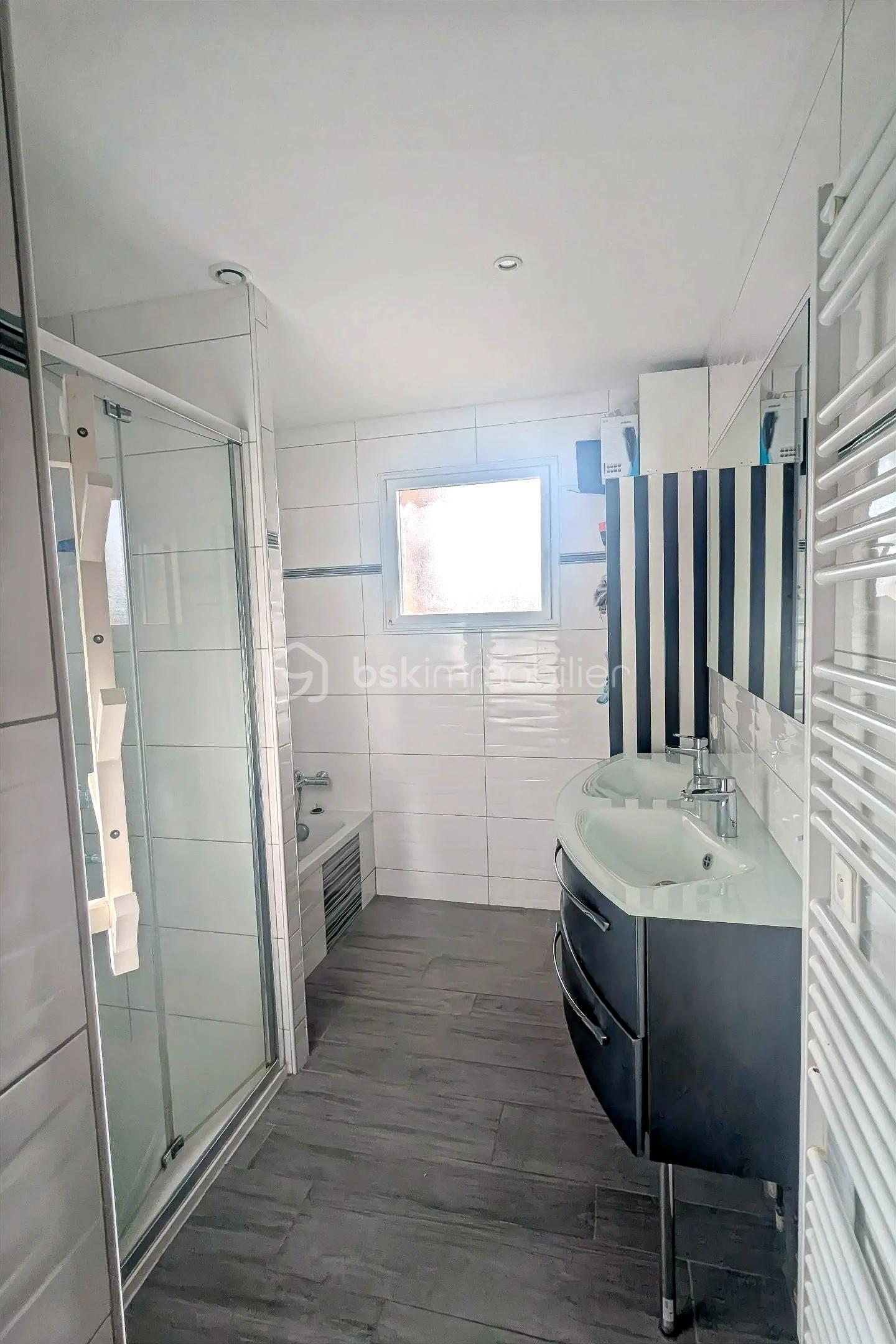 Maison de 113 m² - hoqi-2ff4a70bb9af404dad8956c7e4c6dfd8.jpg