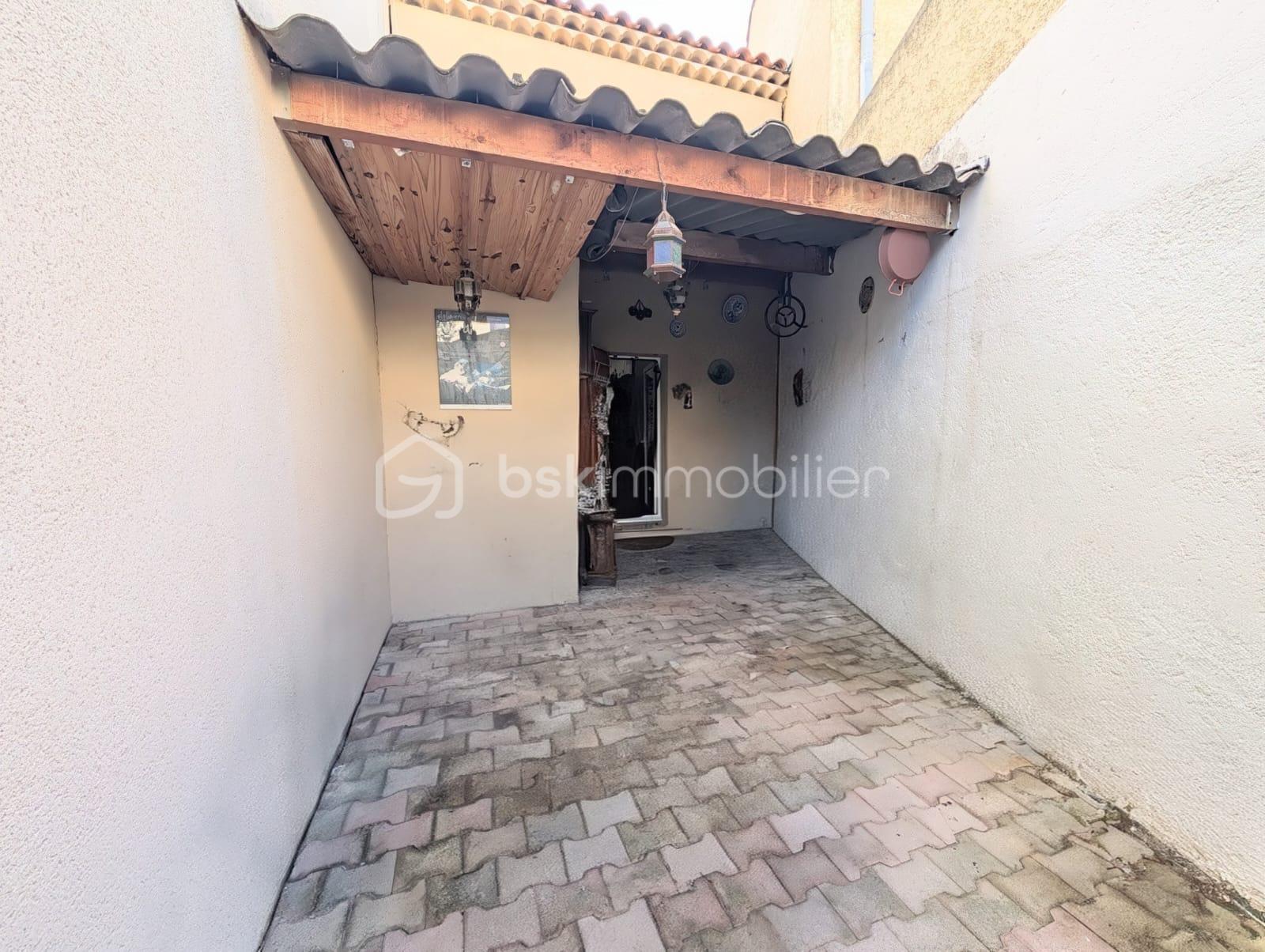 Maison de ville de 70 m² - patio nu face.jpg