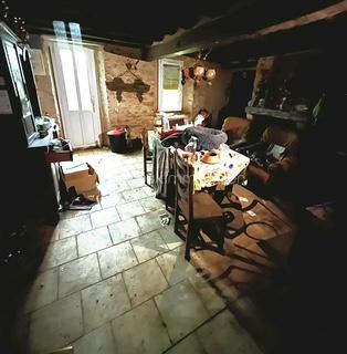 Maison en pierre de 78 m² - salon Aubled.jpg