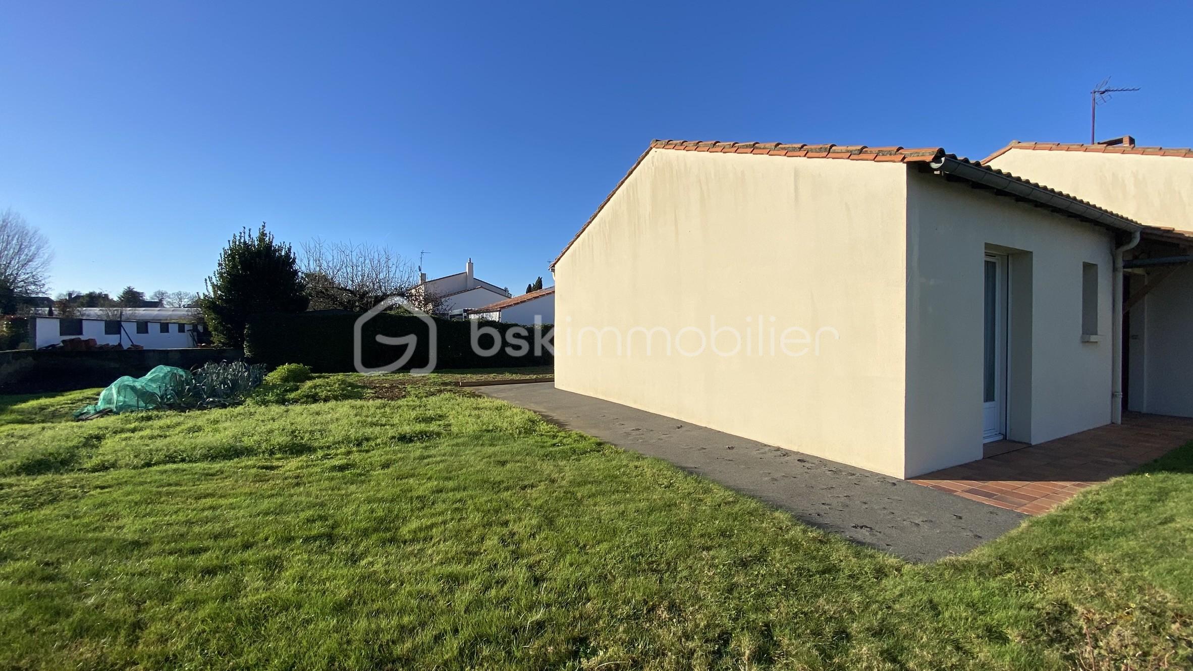 Maison de 106,45 m² - ext_cote_jardin.JPEG