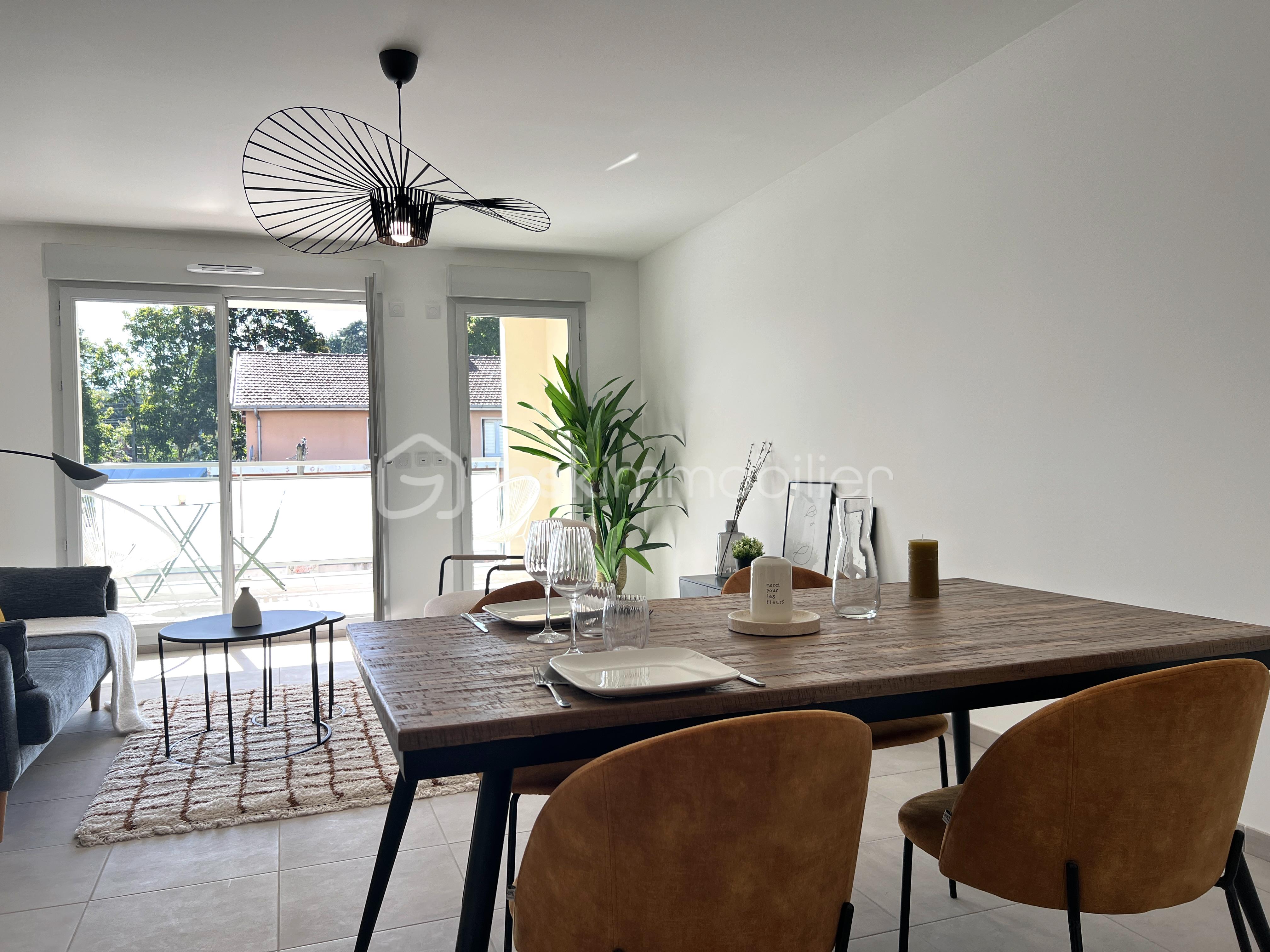 Appartement de 83,98 m² - sejourterrasse.corinnefischer.crepieux.jpg