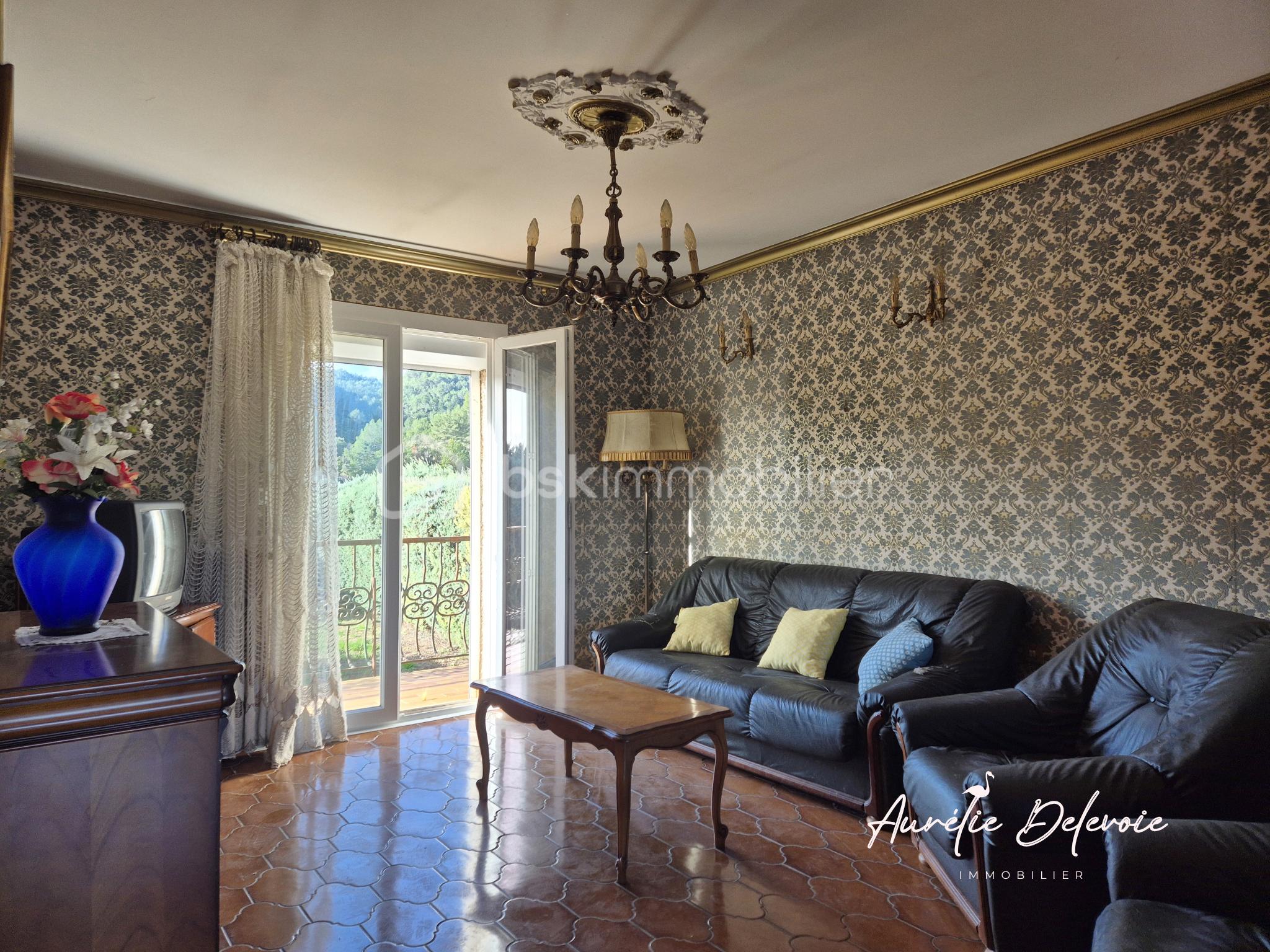 Maison de 211 m² - salon 1er étage.png