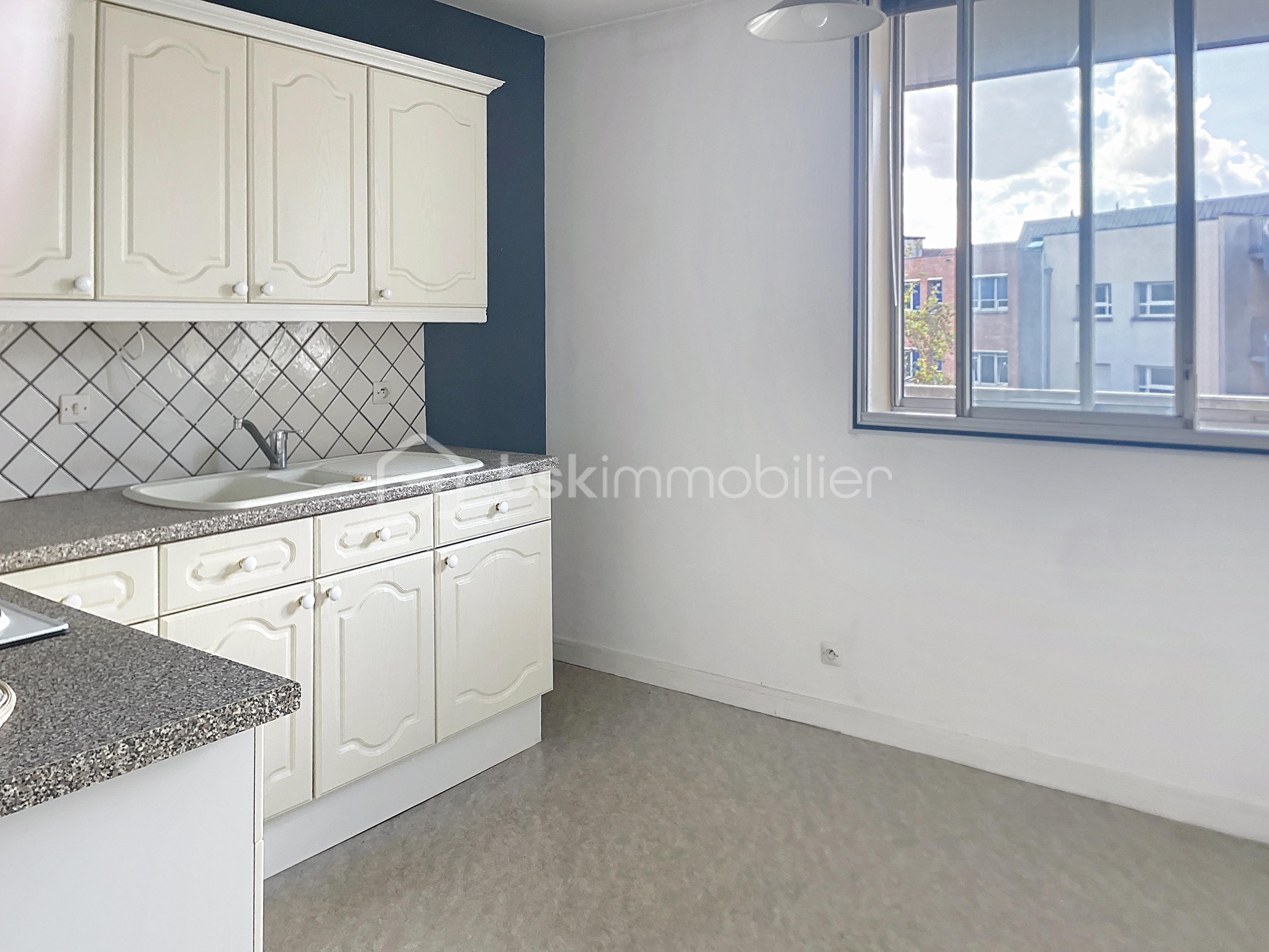 Appartement de 56,19 m² - gmyr_00003.jpg