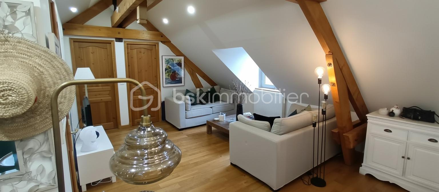 Appartement de 52 m² - petit salon portes fermées.png