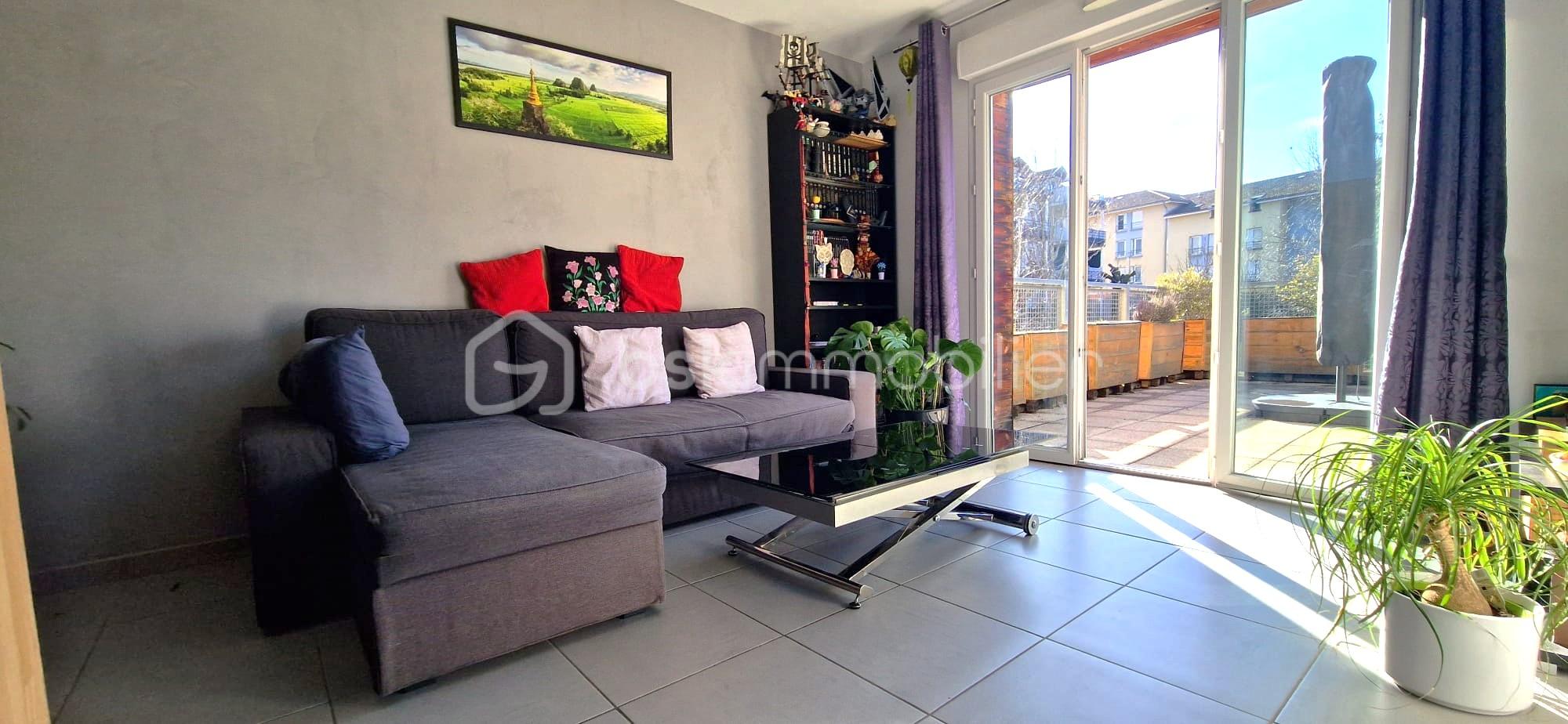 Appartement de 60,88 m² - SALON VUE TERRASSE.jpeg