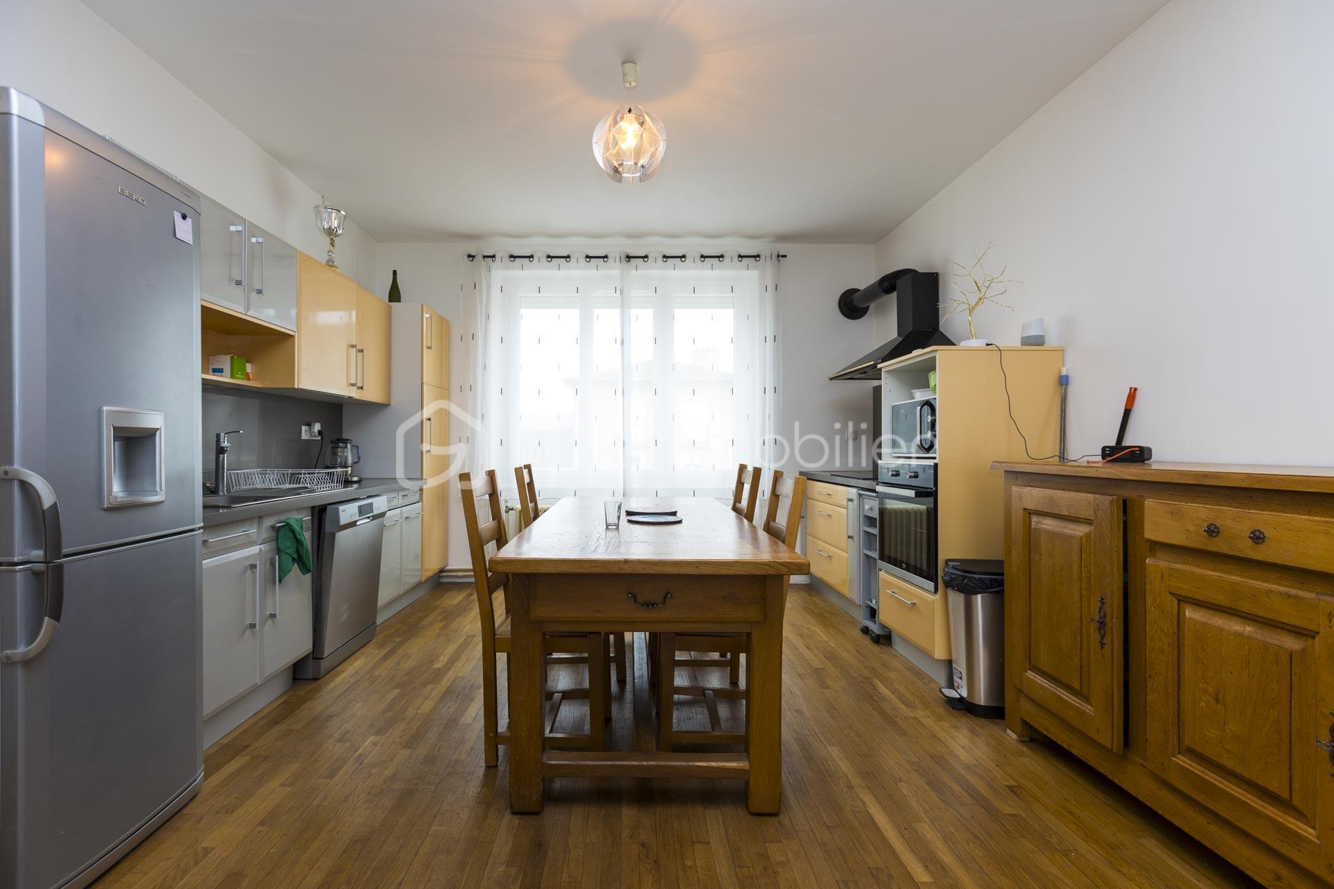 Maison de 159 m² - immo-pbdf-salon-cuisine-2.jpg