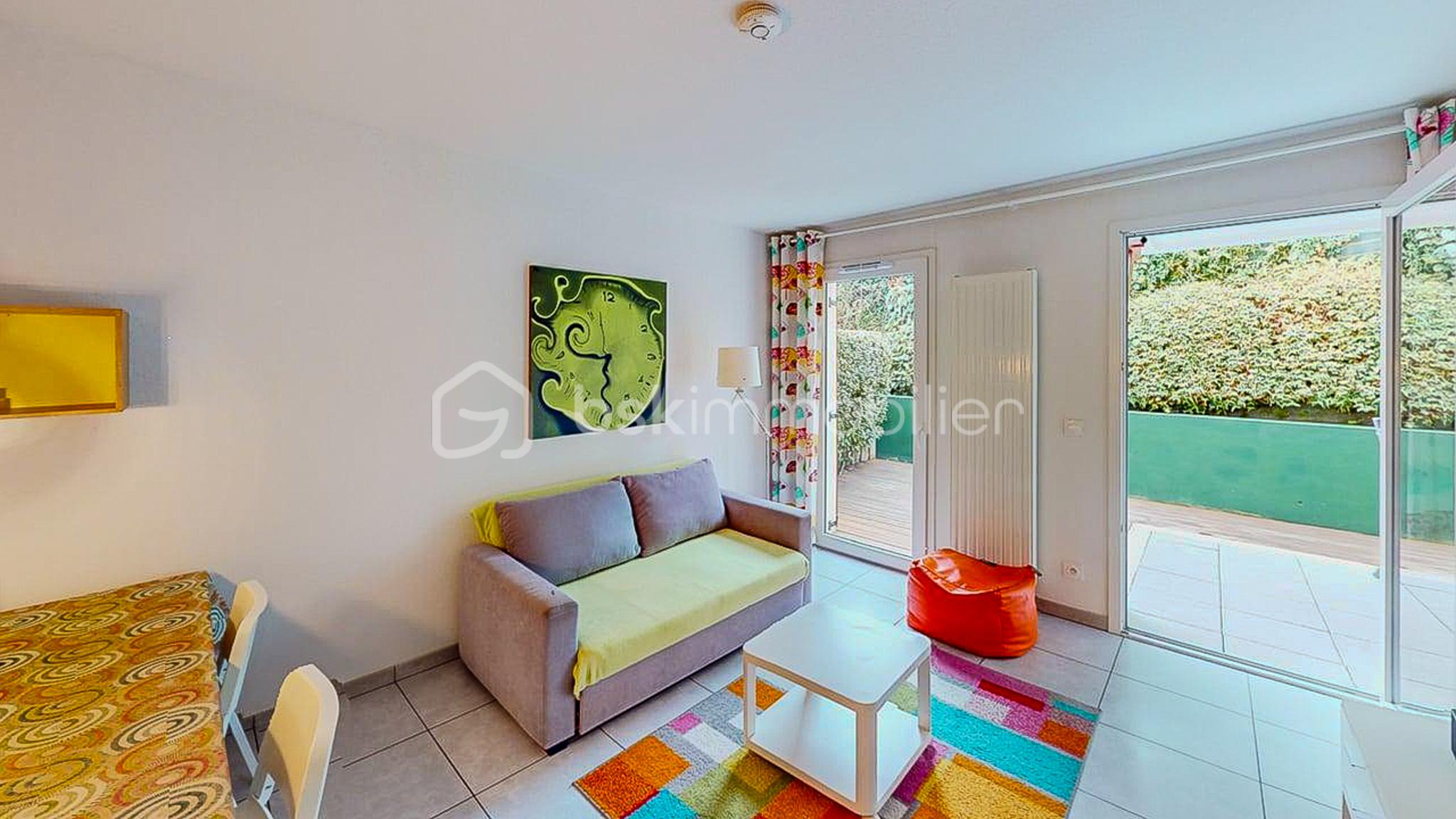 T2-avec-terrasse-Cambo-Les-Bains-Living-Room 1.jpg