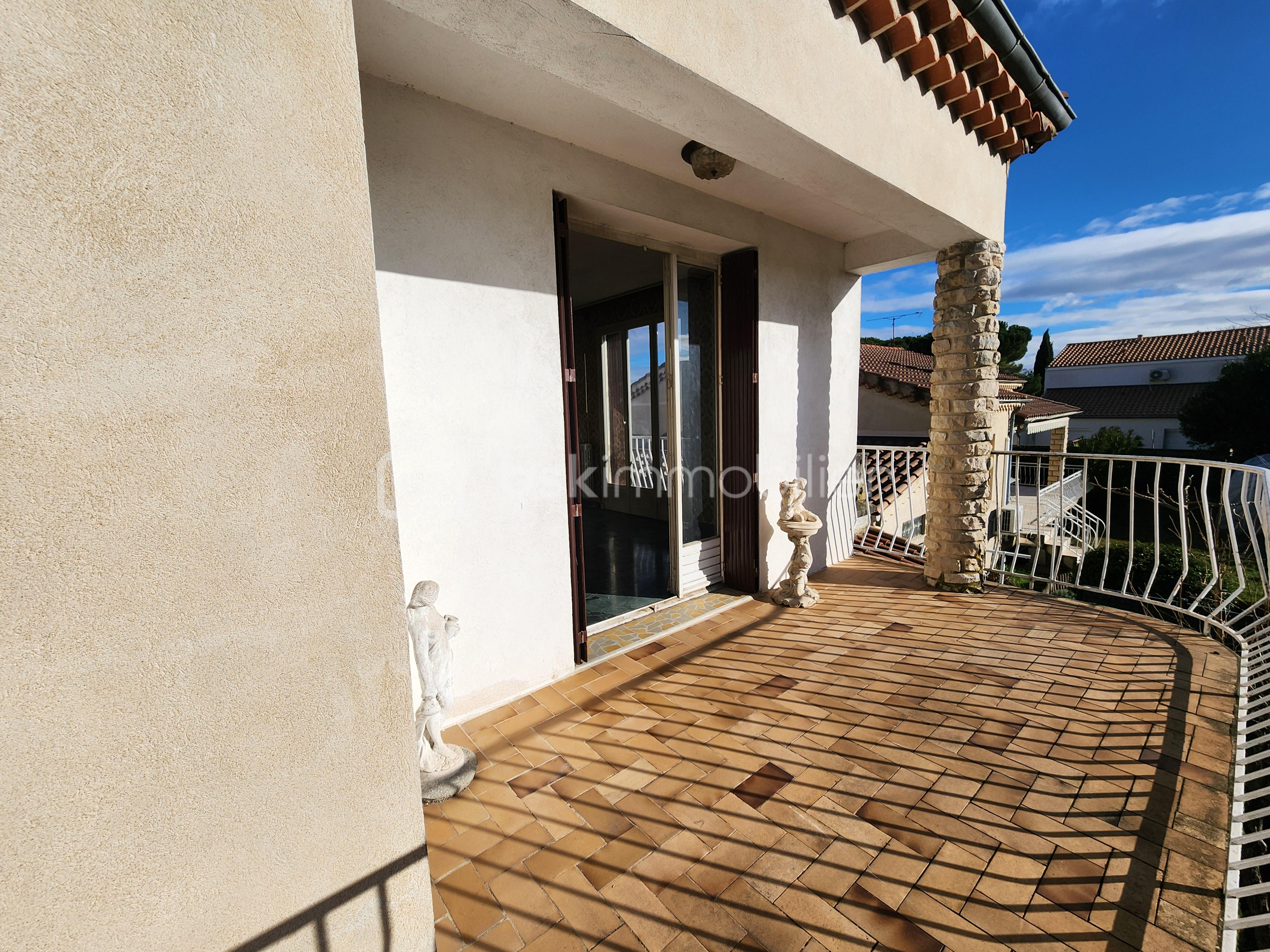 Maison traditionnelle de 165 m² - Balcon vue séjour.jpg