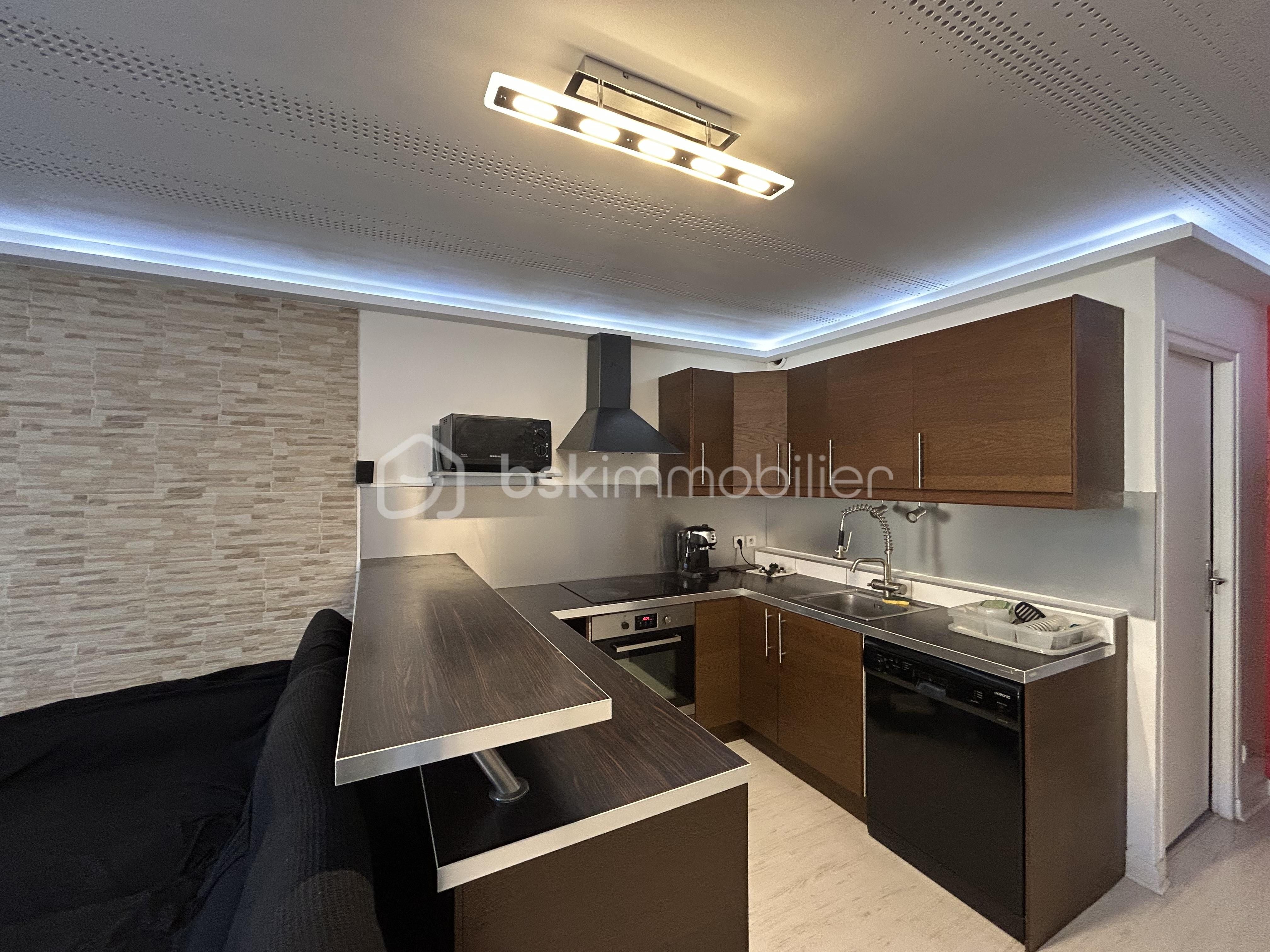 Appartement de 88 m² - Appartement La cote St Andre - Les Halles - Photo cuisine 3.jpg.jpeg