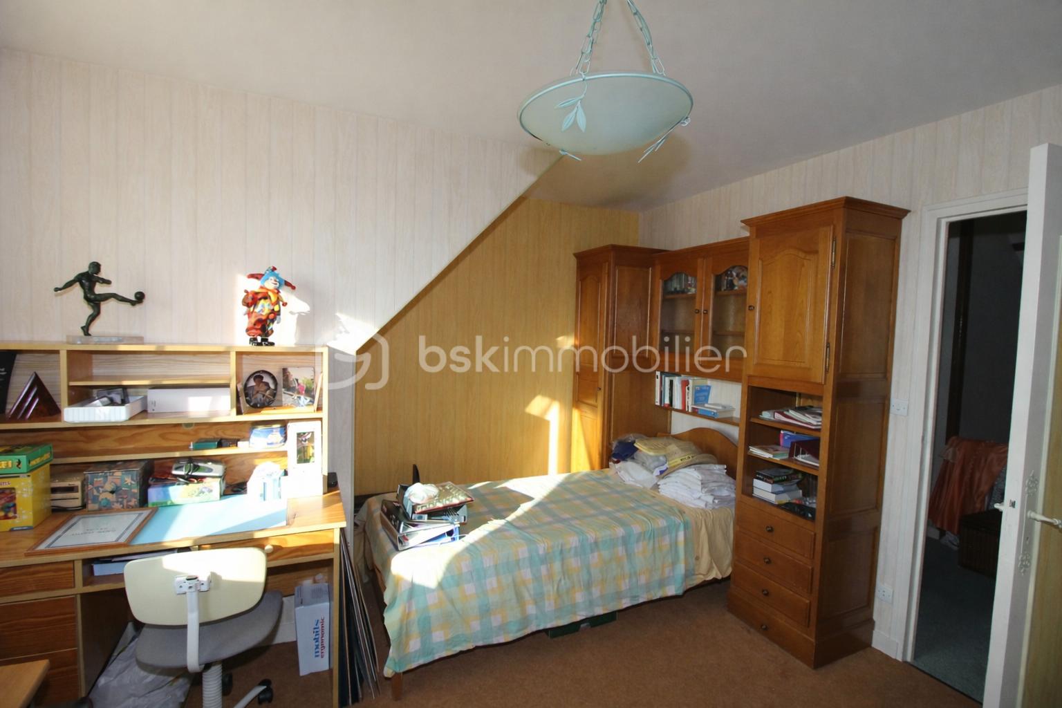 Maison de 200 m² - chambre du haut.png