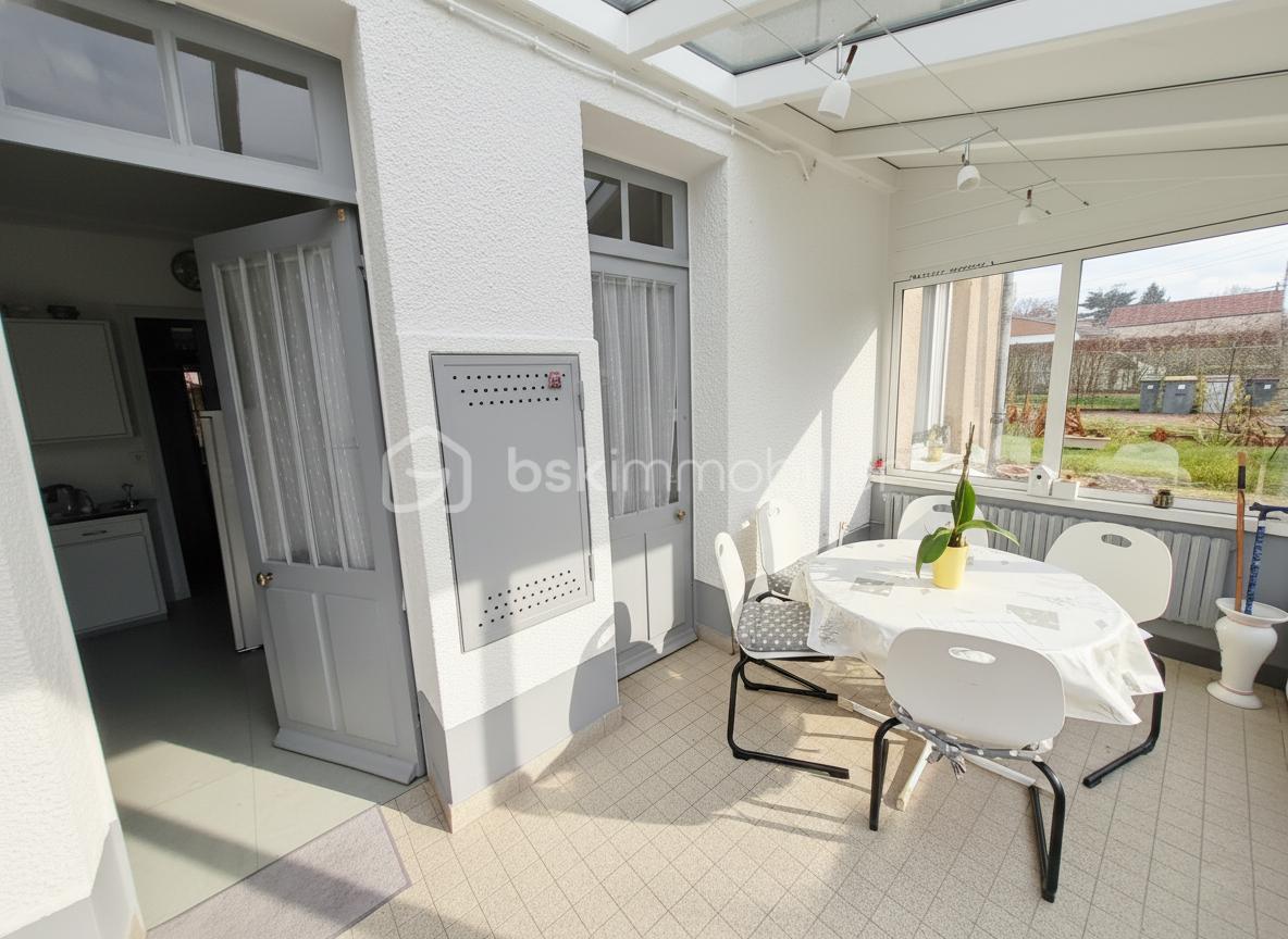 Maison traditionnelle de 141 m² - Veranda.jpg