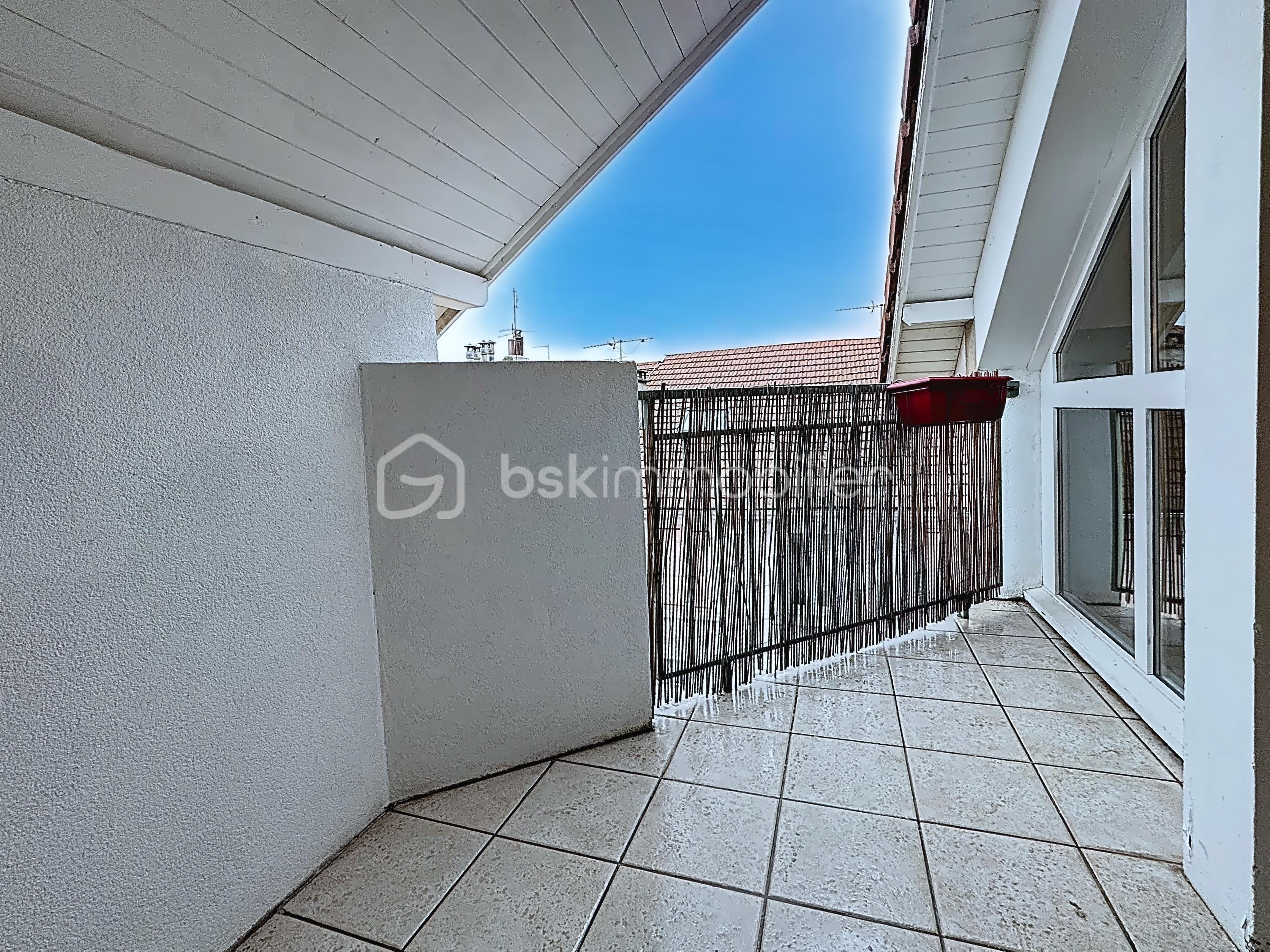 Appartement de 57,74 m² - téléchargement (1).png